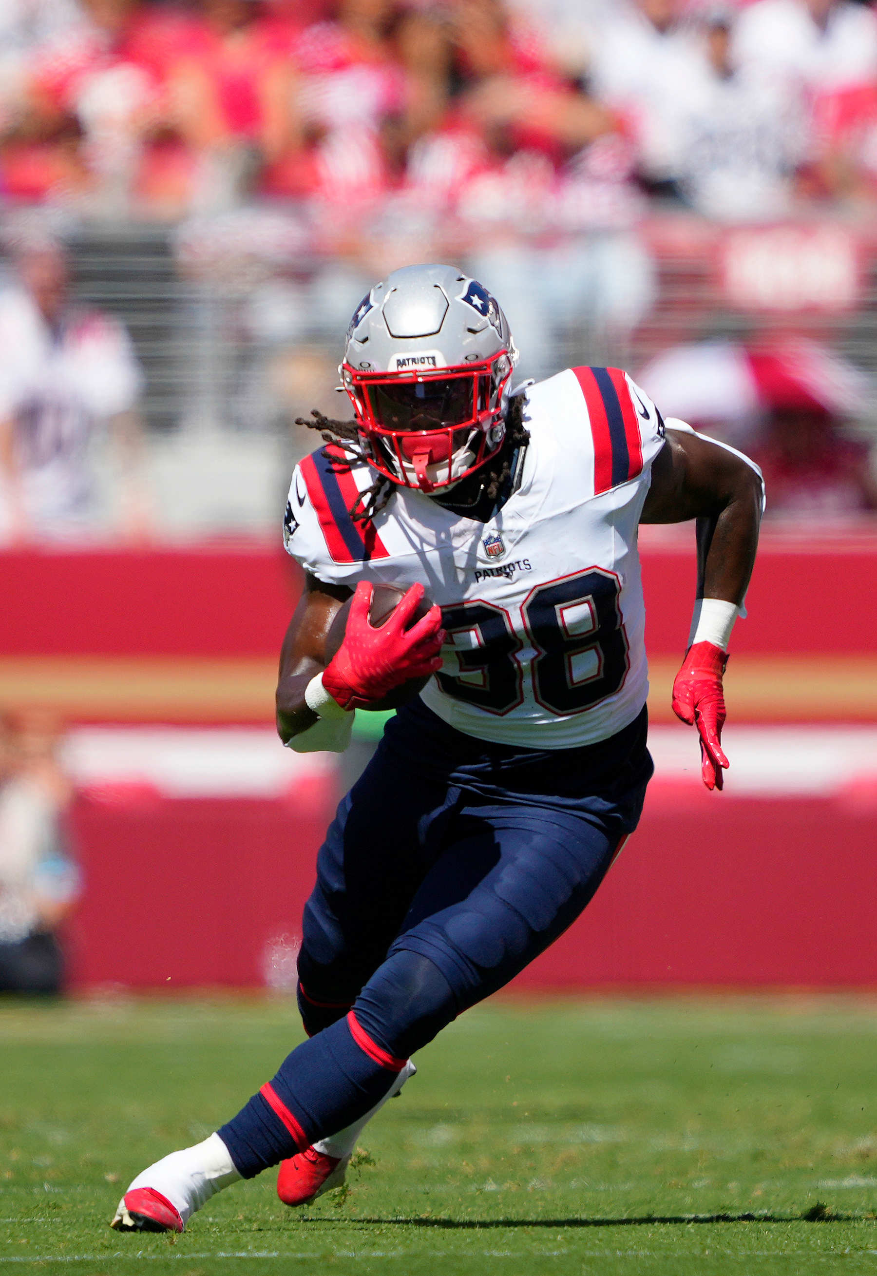 SANTA CLARA, CALIFORNIA - SEPTEMBER 29: Rhamondre Stevenson #38 of the New England Patriots carries the ball against the San Francisco 49ers during the first quarter at Levi's Stadium on September 29, 2024 in Santa Clara, California. (Photo by Thearon W. Henderson/Getty Images)