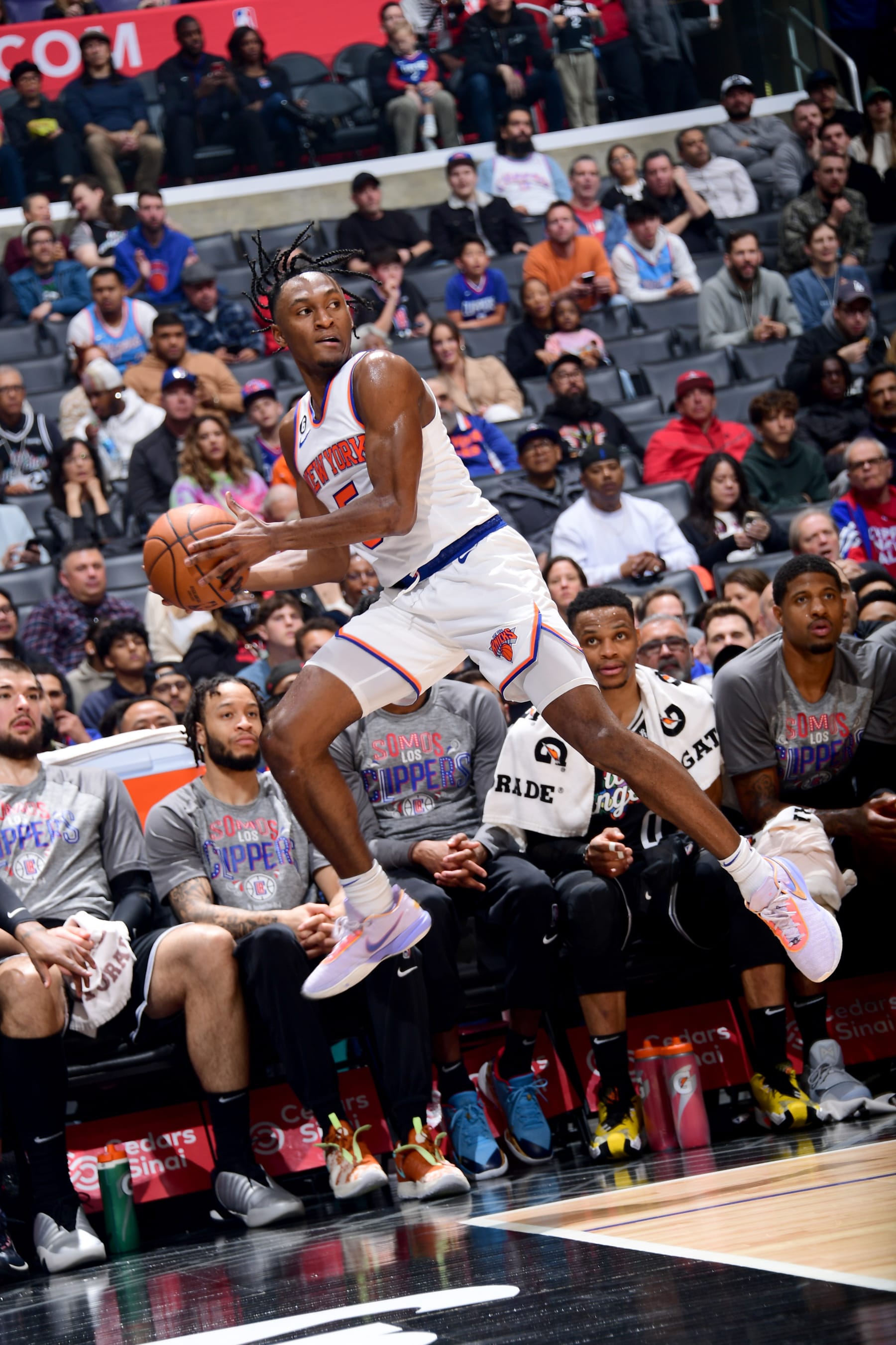 LOS ANGELES, CA - MARCH 11: Immanuel Quickley #5 of the New York Knicks saves a loose ball during the game against the LA Clippers on March 11, 2023 at Crypto.Com Arena in Los Angeles, California. NOTE TO USER: User expressly acknowledges and agrees that, by downloading and/or using this Photograph, user is consenting to the terms and conditions of the Getty Images License Agreement. Mandatory Copyright Notice: Copyright 2023 NBAE (Photo by Adam Pantozzi/NBAE via Getty Images)