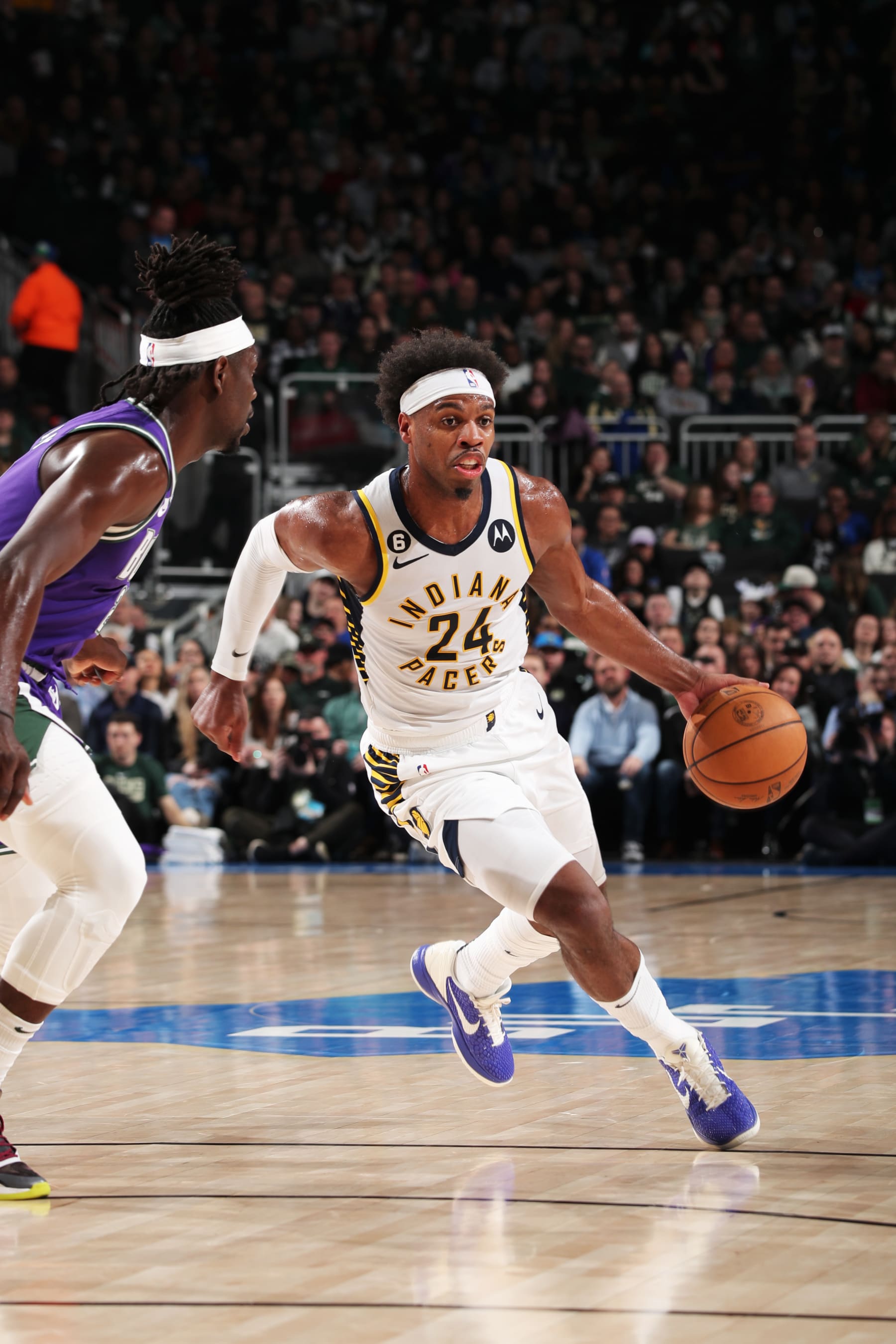 MILWAUKEE, WI - MARCH 16: Buddy Hield #24 of the Indiana Pacers drives to the basket during the game against the Milwaukee Bucks on March 16, 2023 at the Fiserv Forum Center in Milwaukee, Wisconsin. NOTE TO USER: User expressly acknowledges and agrees that, by downloading and or using this Photograph, user is consenting to the terms and conditions of the Getty Images License Agreement. Mandatory Copyright Notice: Copyright 2023 NBAE (Photo by Gary Dineen/NBAE via Getty Images).