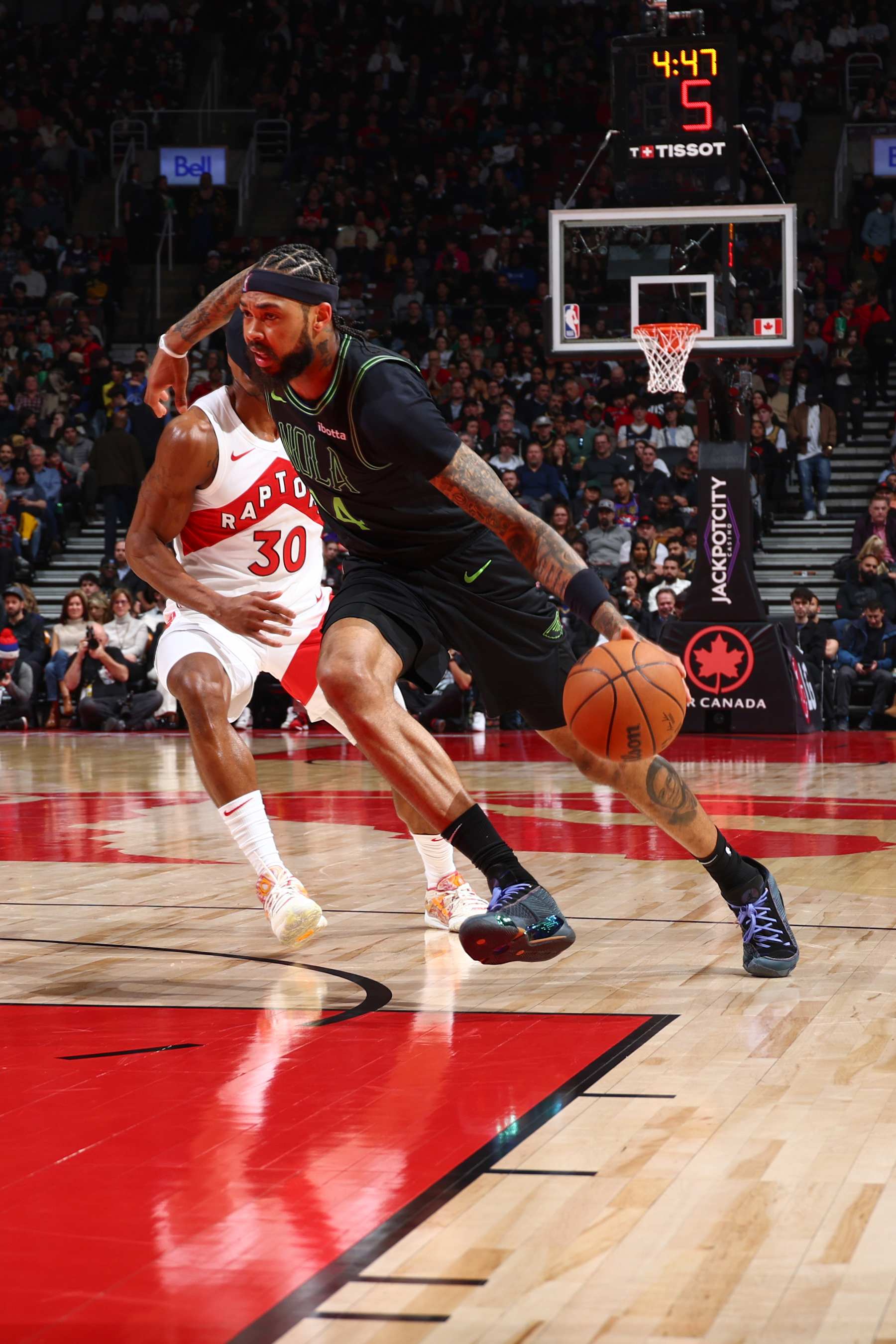 TORONTO, CANADA - MARCH 5:  Brandon Ingram #14 of the New Orleans Pelicans goes to the basket during the game on March 5, 2024 at the Scotiabank Arena in Toronto, Ontario, Canada.  NOTE TO USER: User expressly acknowledges and agrees that, by downloading and or using this Photograph, user is consenting to the terms and conditions of the Getty Images License Agreement.  Mandatory Copyright Notice: Copyright 2024 NBAE (Photo by Vaughn Ridley/NBAE via Getty Images)
