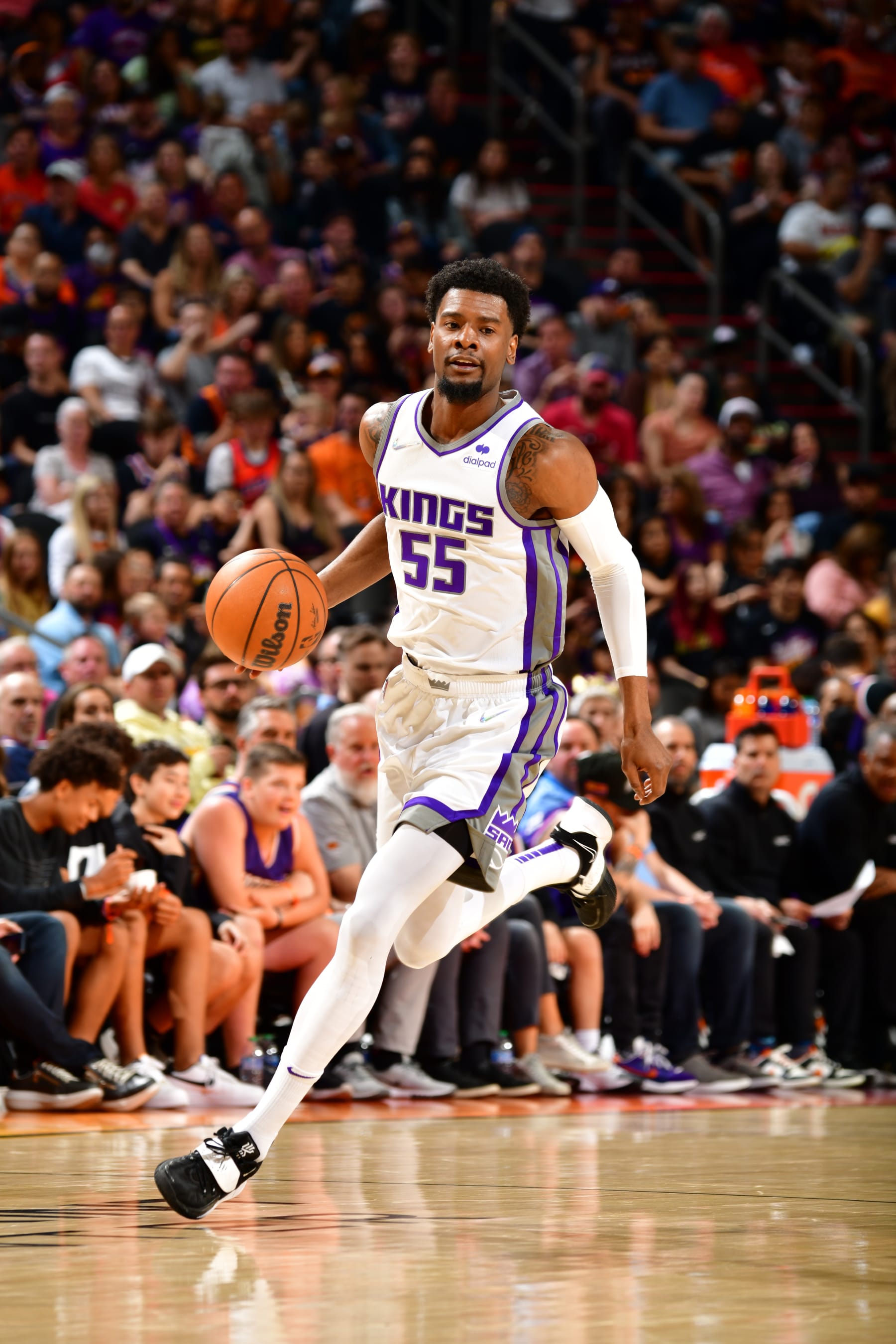 PHOENIX, AZ - APRIL 10: Josh Jackson #55 of the Sacramento Kings dribbles the ball during the game against the Phoenix Suns on April 10, 2022 at Footprint Center in Phoenix, Arizona. NOTE TO USER: User expressly acknowledges and agrees that, by downloading and or using this photograph, user is consenting to the terms and conditions of the Getty Images License Agreement. Mandatory Copyright Notice: Copyright 2022 NBAE (Photo by Barry Gossage/NBAE via Getty Images)