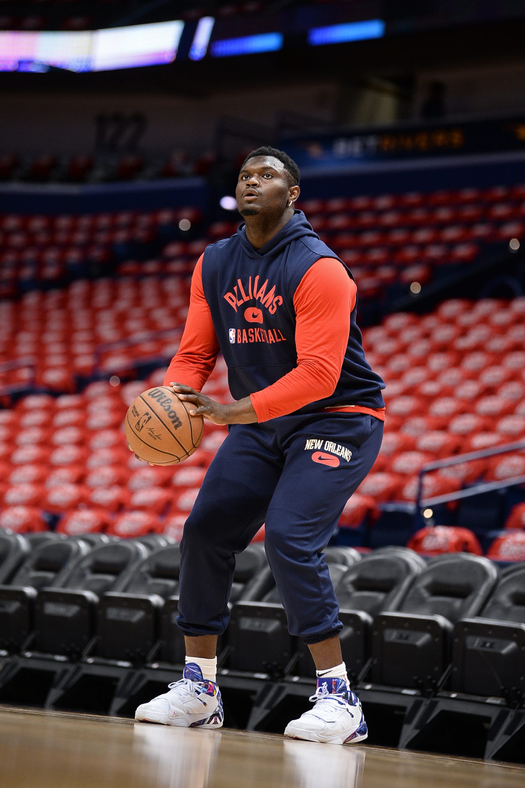 NEW ORLEANS, LA - APRIL 28:  Zion Williamson #1 of the New Orleans Pelicans warms up before the game against the Phoenix Suns during Round 1 Game 6 of the 2022 NBA Playoffs on April 28, 2022 at the Smoothie King Center in New Orleans, Louisiana. NOTE TO USER: User expressly acknowledges and agrees that, by downloading and or using this Photograph, user is consenting to the terms and conditions of the Getty Images License Agreement. Mandatory Copyright Notice: Copyright 2022 NBAE (Photo by David Dow/NBAE via Getty Images)