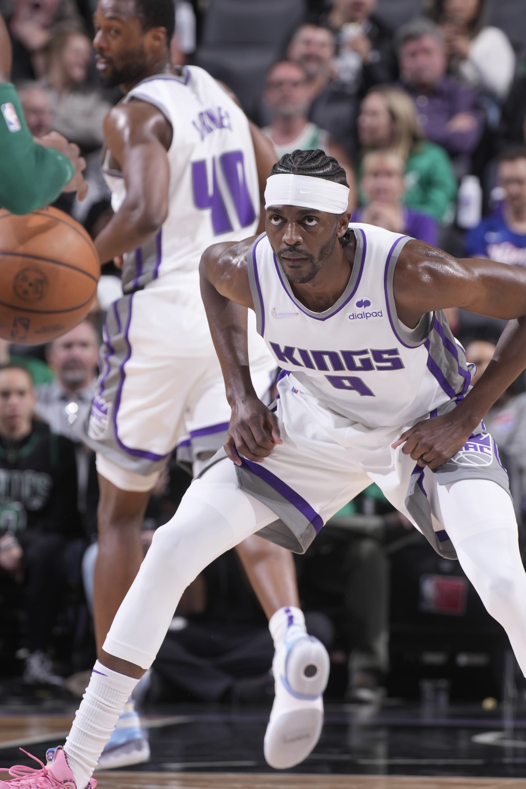 SACRAMENTO, CA - MARCH 18: Justin Holiday #9 of the Sacramento Kings defends against the Boston Celtics on March 18, 2022 at Golden 1 Center in Sacramento, California. NOTE TO USER: User expressly acknowledges and agrees that, by downloading and or using this photograph, User is consenting to the terms and conditions of the Getty Images Agreement. Mandatory Copyright Notice: Copyright 2022 NBAE (Photo by Rocky Widner/NBAE via Getty Images)