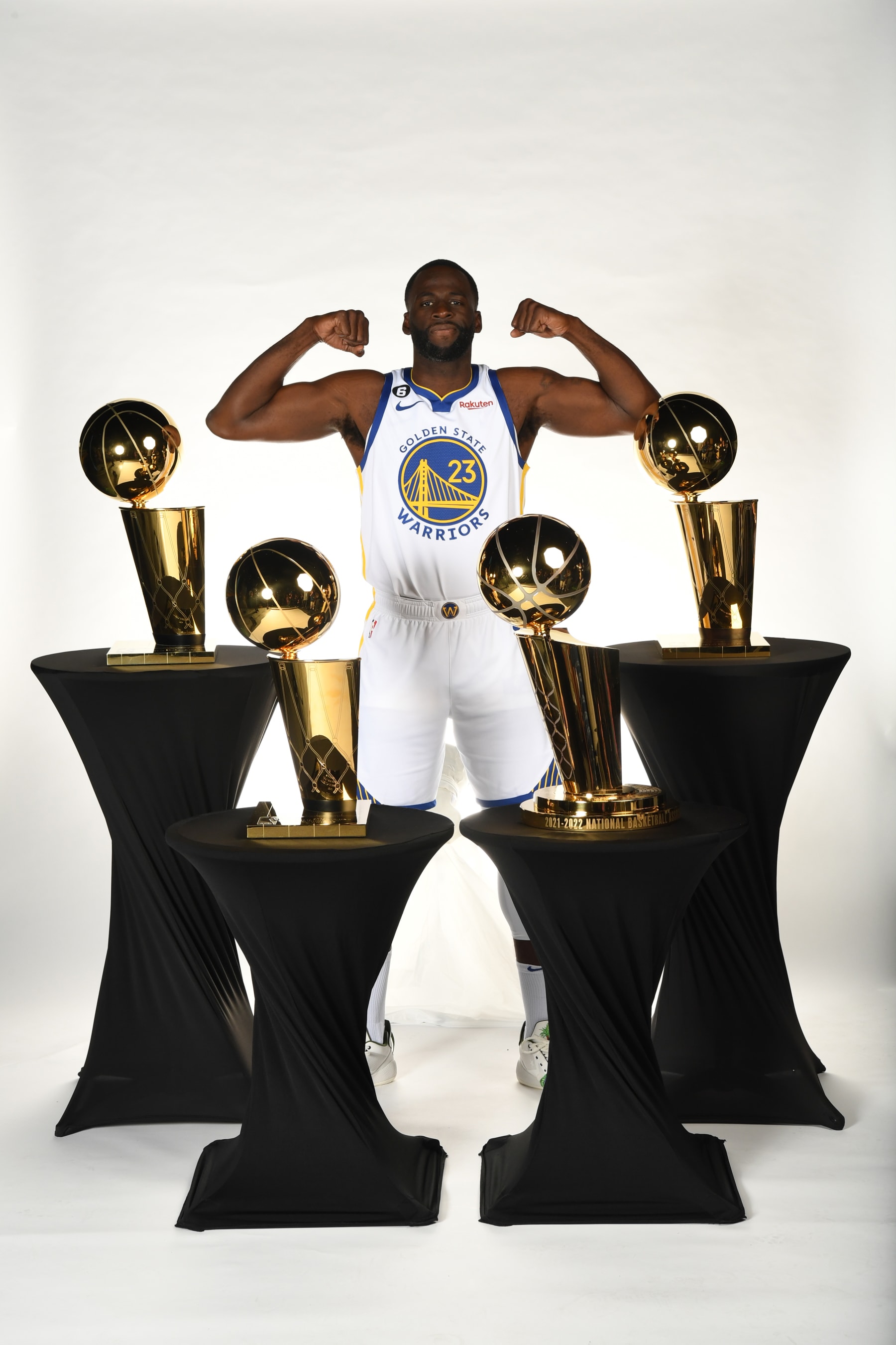 SAN FRANCISCO, CA - SEPTEMBER 25: Draymond Green #23 of the Golden State Warriors poses for a portrait with the Larry OBrien trophies during 2022 NBA Media Day September 25, 2022 at Chase Center in San Francisco, California. NOTE TO USER: User expressly acknowledges and agrees that, by downloading and or using this photograph, user is consenting to the terms and conditions of Getty Images License Agreement. Mandatory Copyright Notice: Copyright 2022 NBAE (Photo by Noah Graham/NBAE via Getty Images)