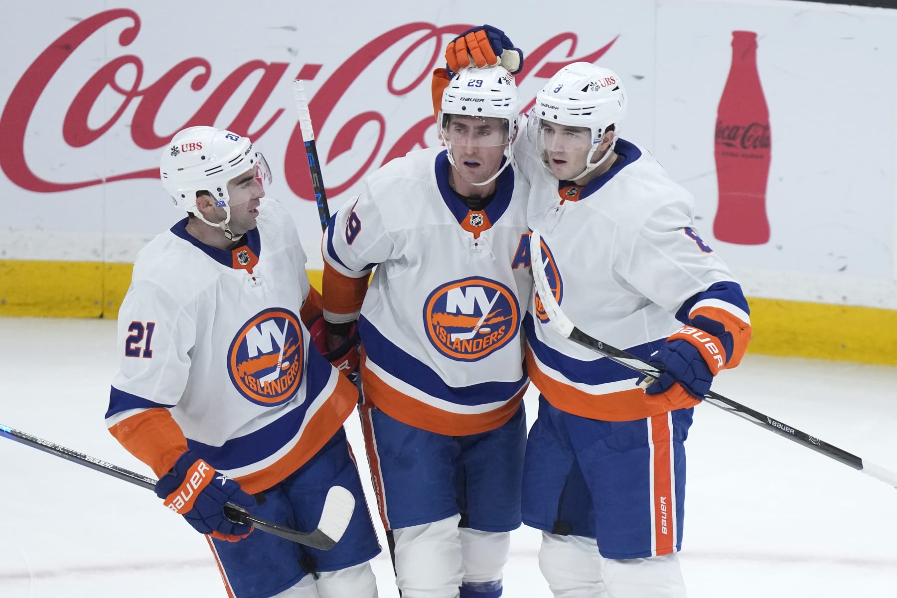 New York Islanders center Brock Nelson, center, celebrates his goal with teammates center Kyle Palmieri, left, and defenseman Noah Dobson in the first period of an NHL hockey game against the Boston Bruins, Thursday, Nov. 9, 2023, in Boston. (AP Photo/Steven Senne)