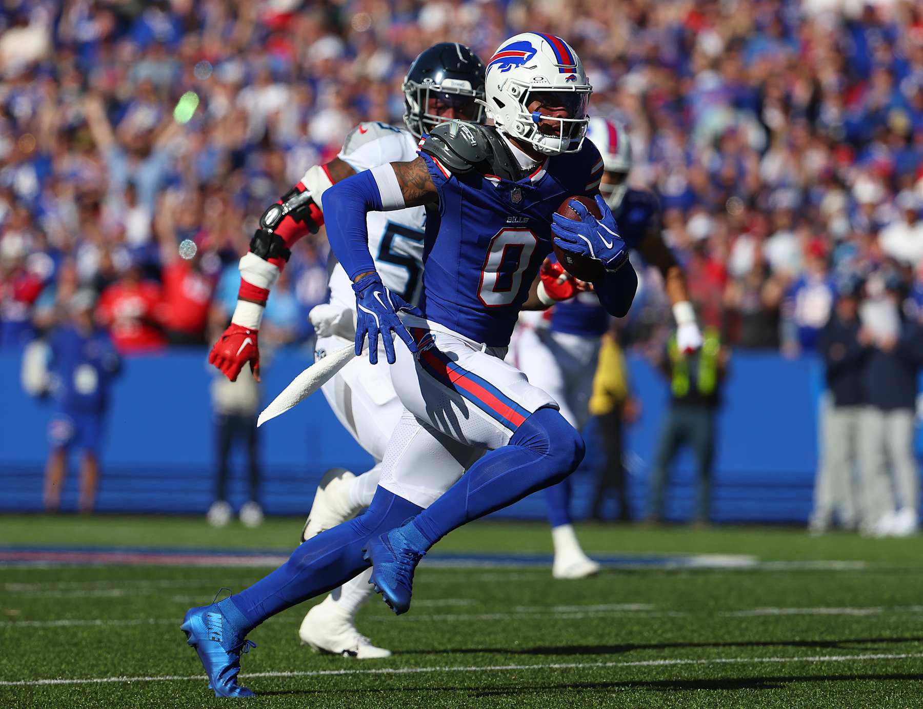 ORCHARD PARK, NEW YORK - OCTOBER 20: Keon Coleman #0 of the Buffalo Bills runs the ball after a catch against the Tennessee Titans during the second quarter at Highmark Stadium on October 20, 2024 in Orchard Park, New York. (Photo by Timothy T Ludwig/Getty Images)