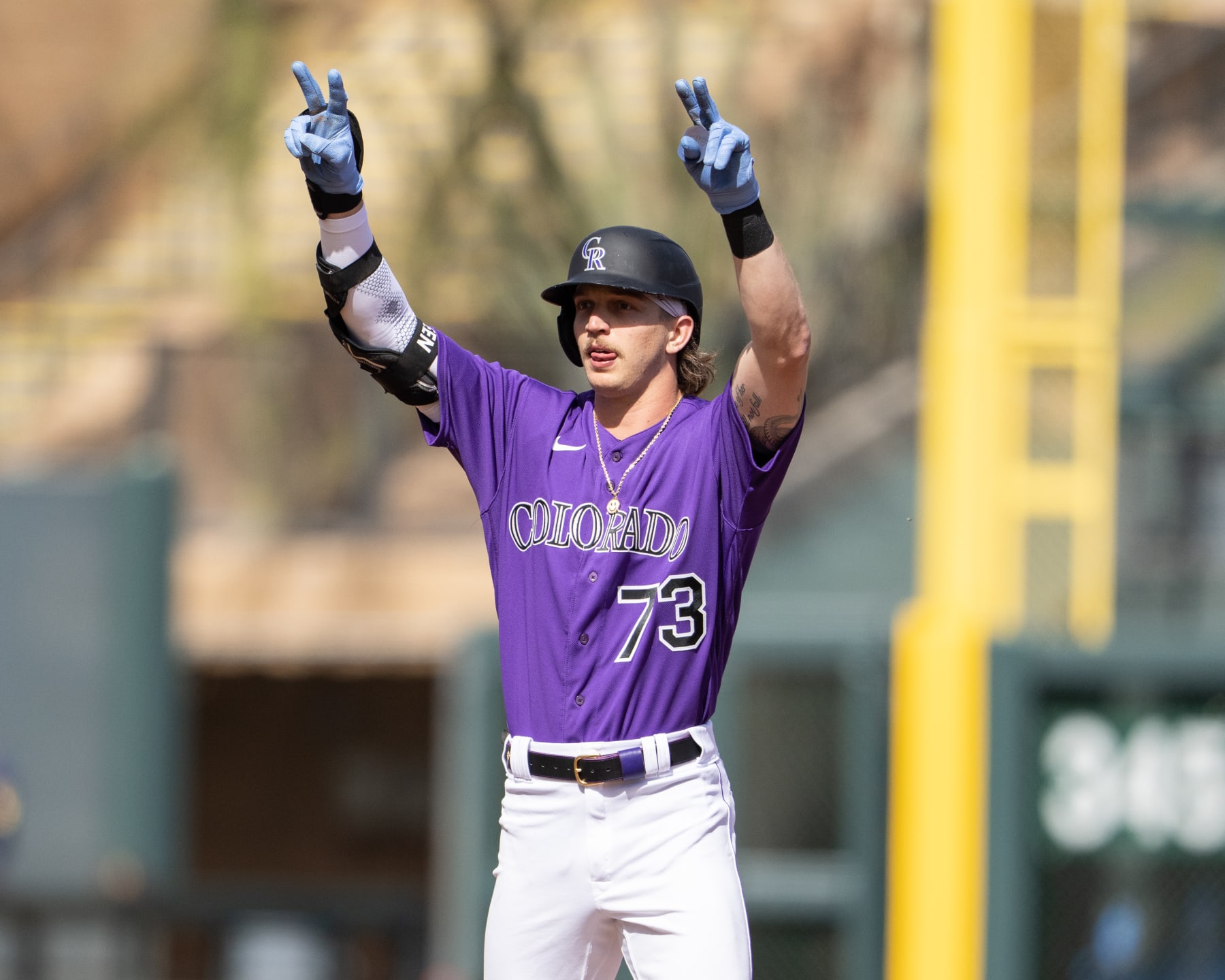 SCOTTSDALE, AZ - FEBRUARY 26: Zac Veen #73 of the Colorado Rockies signals to the dugout after a double at Salt River Fields at Talking Stick on February 26, 2023 in Scottsdale, Arizona. (Photo by Kyle Cooper/Colorado Rockies/Getty Images)
