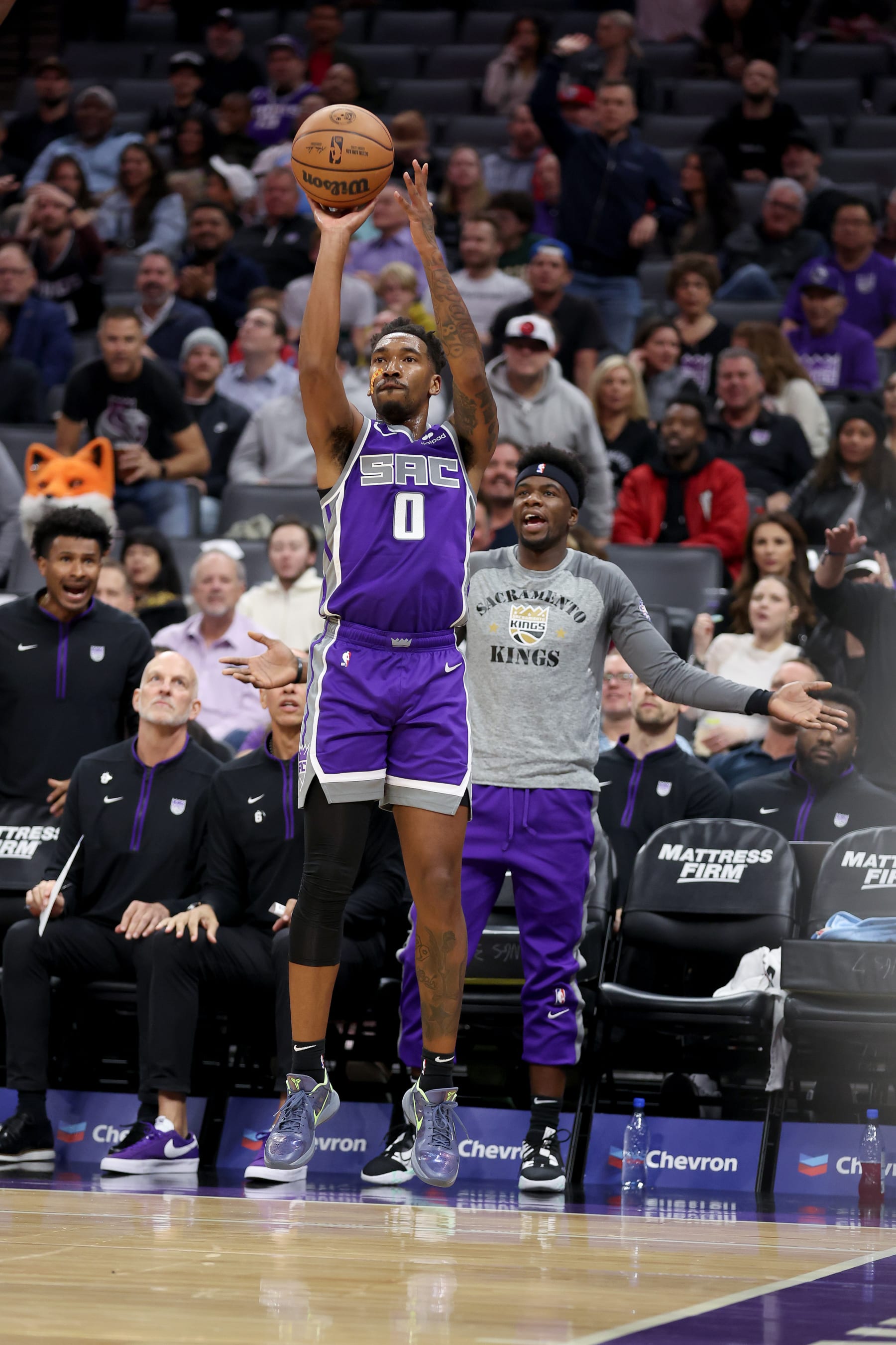 SACRAMENTO, CALIFORNIA - NOVEMBER 09: Malik Monk #0 of the Sacramento Kings shoots a three-point basket against the Cleveland Cavaliers in the first half at Golden 1 Center on November 09, 2022 in Sacramento, California. NOTE TO USER: User expressly acknowledges and agrees that, by downloading and or using this photograph, User is consenting to the terms and conditions of the Getty Images License Agreement.  (Photo by Ezra Shaw/Getty Images)