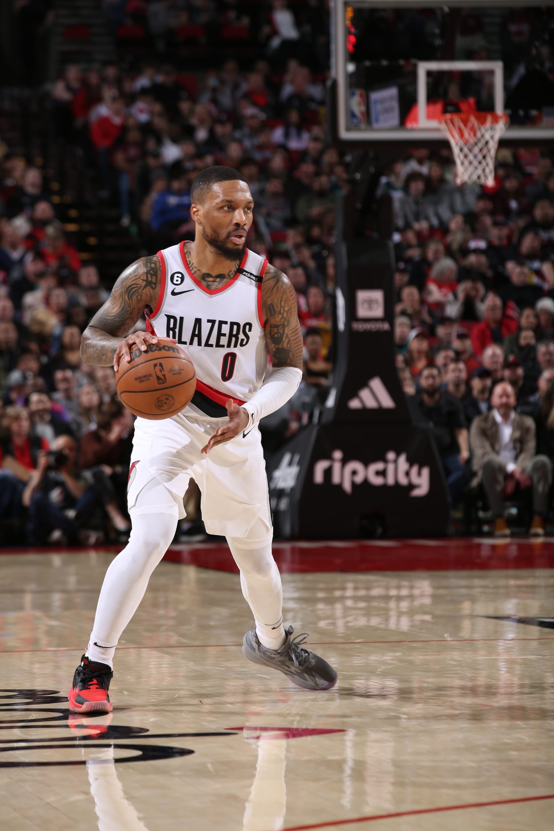 PORTLAND, OR - MARCH 19: Damian Lillard #0 of the Portland Trail Blazers moves the ball during the game against the LA Clippers on March 19, 2023 at the Moda Center Arena in Portland, Oregon. NOTE TO USER: User expressly acknowledges and agrees that, by downloading and or using this photograph, user is consenting to the terms and conditions of the Getty Images License Agreement. Mandatory Copyright Notice: Copyright 2023 NBAE (Photo by Cameron Browne/NBAE via Getty Images)