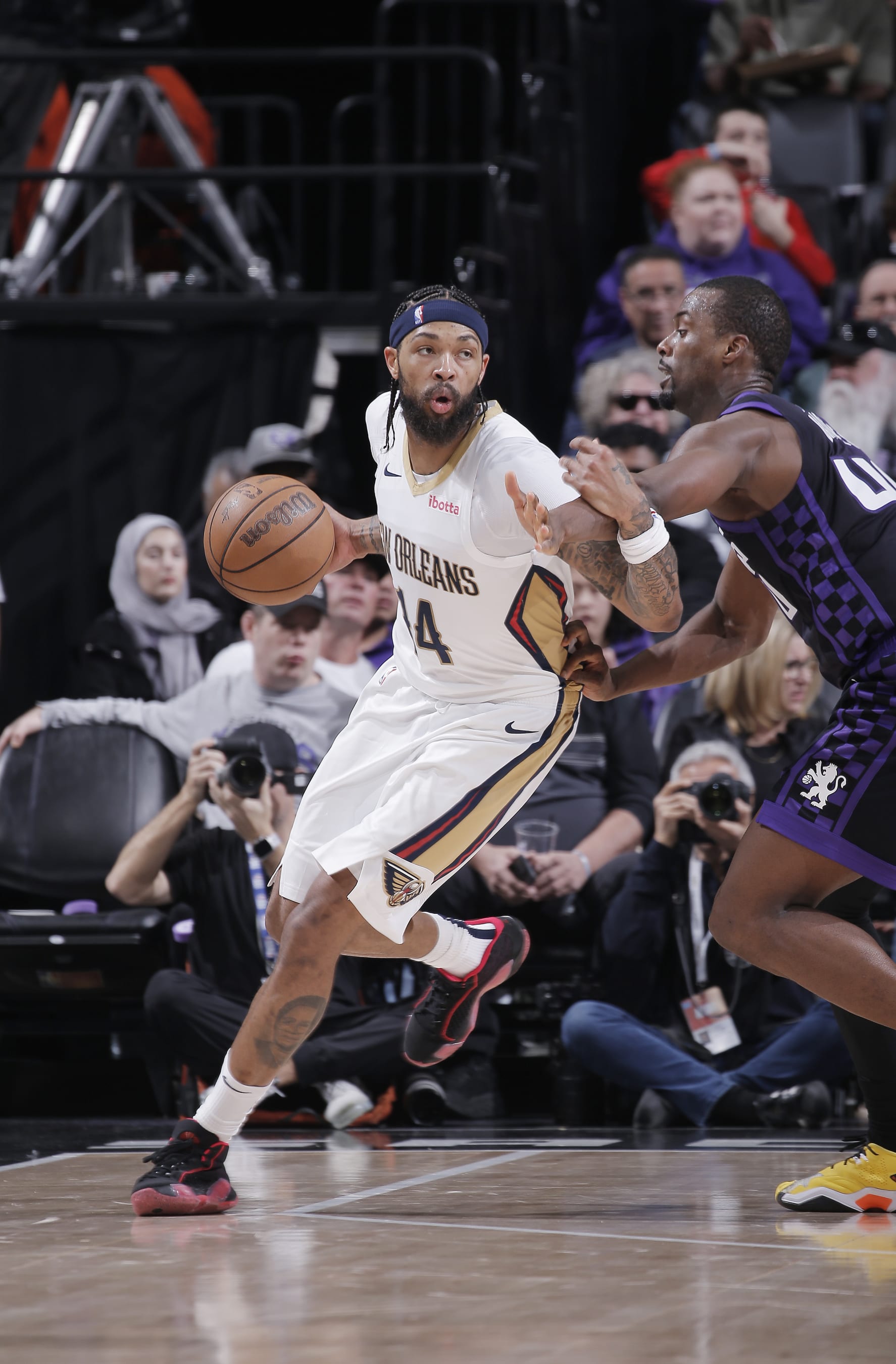 SACRAMENTO, CA - JANUARY 7: Brandon Ingram #14 of the New Orleans Pelicans handles the ball during the game against the Sacramento Kings on January 7, 2024 at Golden 1 Center in Sacramento, California. NOTE TO USER: User expressly acknowledges and agrees that, by downloading and or using this photograph, User is consenting to the terms and conditions of the Getty Images Agreement. Mandatory Copyright Notice: Copyright 2024 NBAE (Photo by Rocky Widner/NBAE via Getty Images)