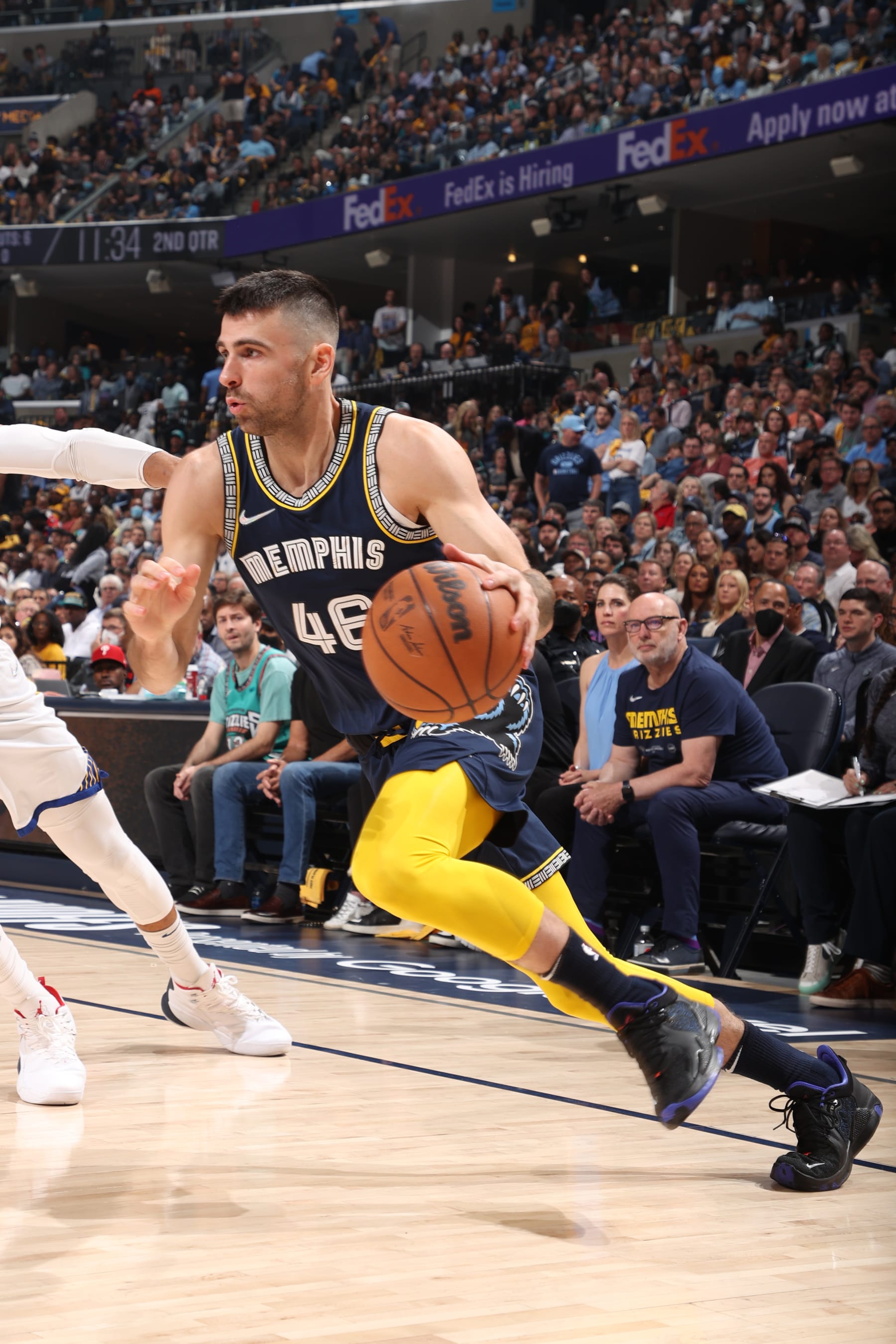 MEMPHIS, TN - MAY 3: John Konchar #46 of the Memphis Grizzlies drives to the basket against the Golden State Warriors during Game 2 of the 2022 NBA Playoffs Western Conference Semifinals on May 3, 2022 at FedExForum in Memphis, Tennessee. NOTE TO USER: User expressly acknowledges and agrees that, by downloading and or using this photograph, User is consenting to the terms and conditions of the Getty Images License Agreement. Mandatory Copyright Notice: Copyright 2022 NBAE (Photo by Joe Murphy/NBAE via Getty Images)
