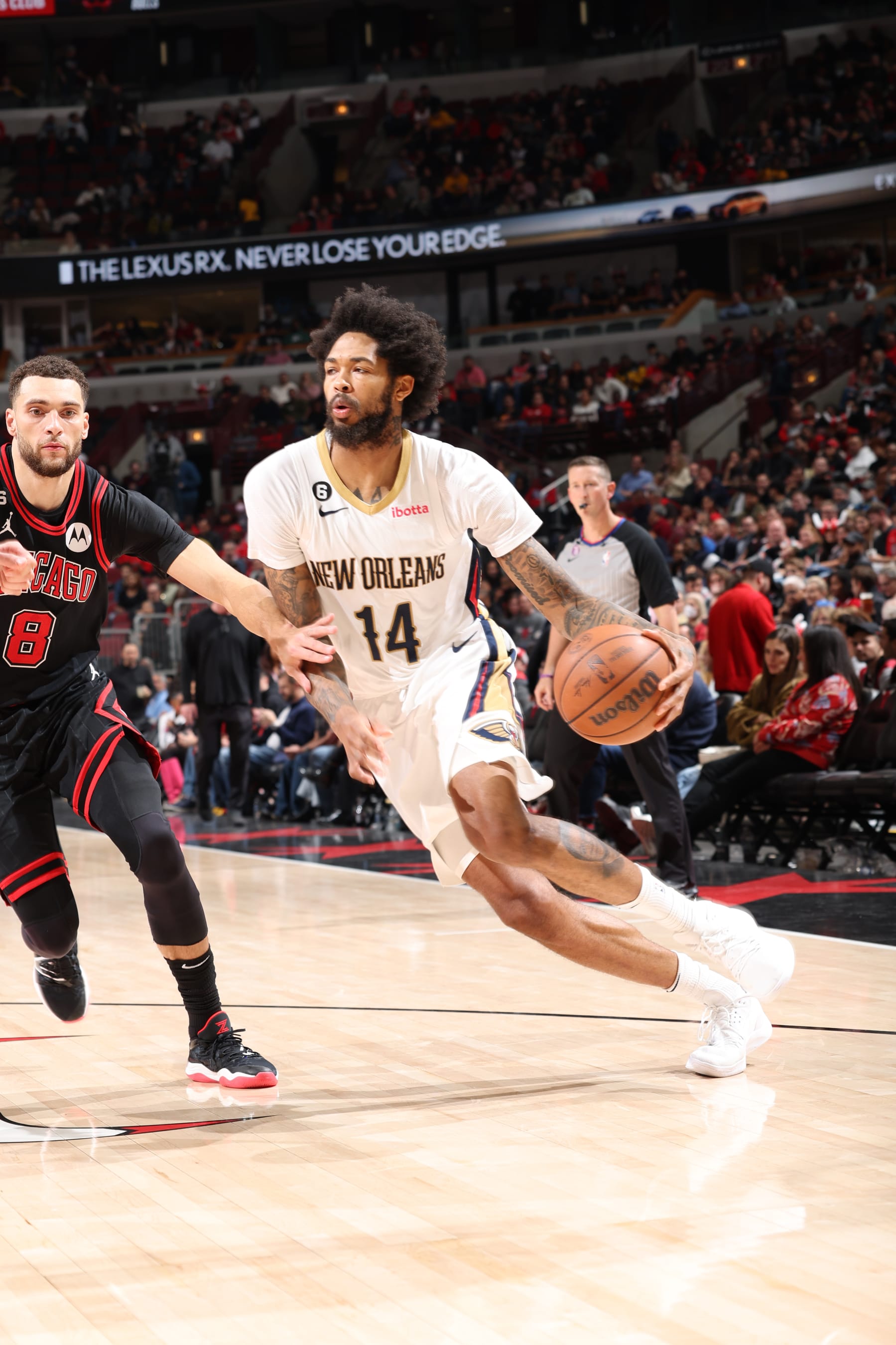 CHICAGO, IL - NOVEMBER 9: Brandon Ingram #14 of the New Orleans Pelicans dribbles the ball during the game against the Chicago Bulls on November 9, 2022 at United Center in Chicago, Illinois. NOTE TO USER: User expressly acknowledges and agrees that, by downloading and or using this photograph, User is consenting to the terms and conditions of the Getty Images License Agreement. Mandatory Copyright Notice: Copyright 2022 NBAE (Photo by Jeff Haynes/NBAE via Getty Images)