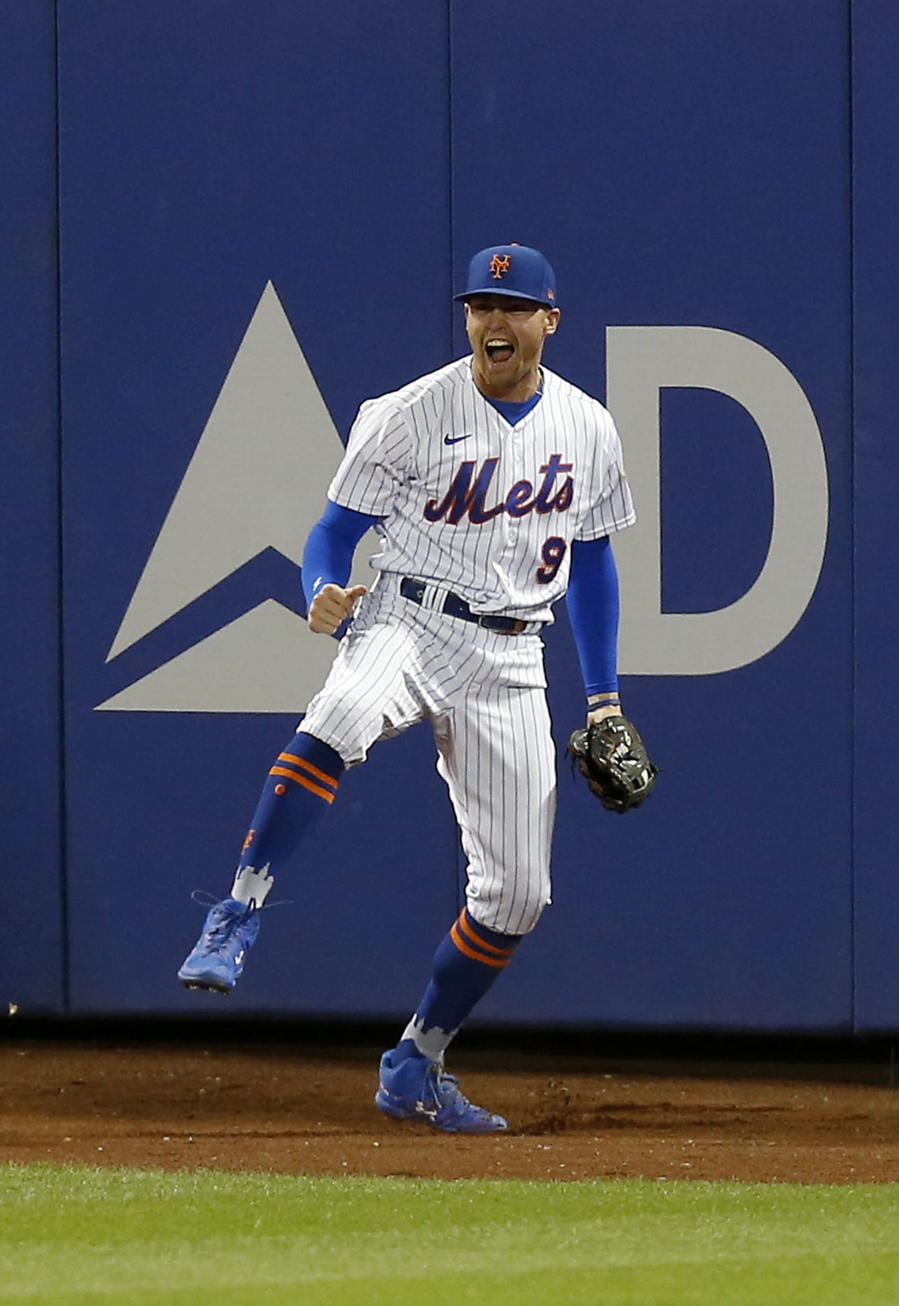 NEW YORK, NEW YORK - AUGUST 31:  Brandon Nimmo #9 of the New York Mets reacts after making a catch during the seventh inning against the Los Angeles Dodgers at Citi Field on August 31, 2022 in New York City. (Photo by Jim McIsaac/Getty Images)