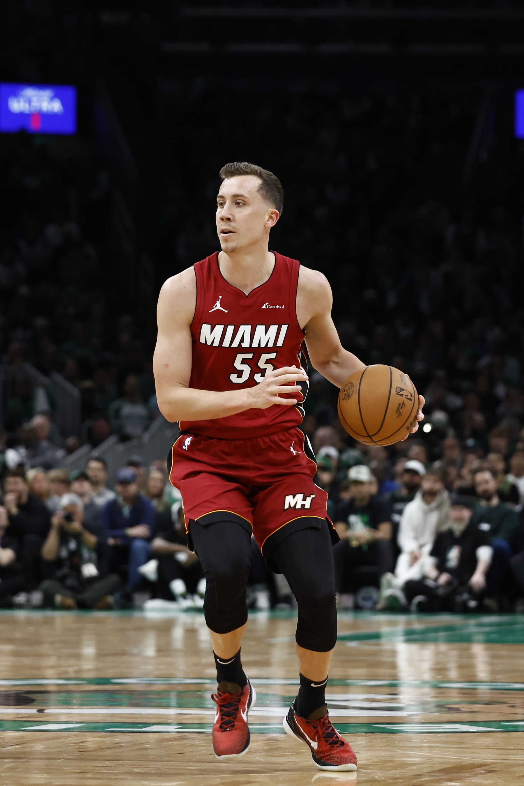 BOSTON, MA - APRIL 21: Duncan Robinson #55 of the Miami Heat against the Boston Celtics during the first quarter of game one of the Eastern Conference First Round Playoffs at TD Garden on April 21, 2024 in Boston, Massachusetts. NOTE TO USER: User expressly acknowledges and agrees that, by downloading and/or using this Photograph, user is consenting to the terms and conditions of the Getty Images License Agreement. (Photo By Winslow Townson/Getty Images)