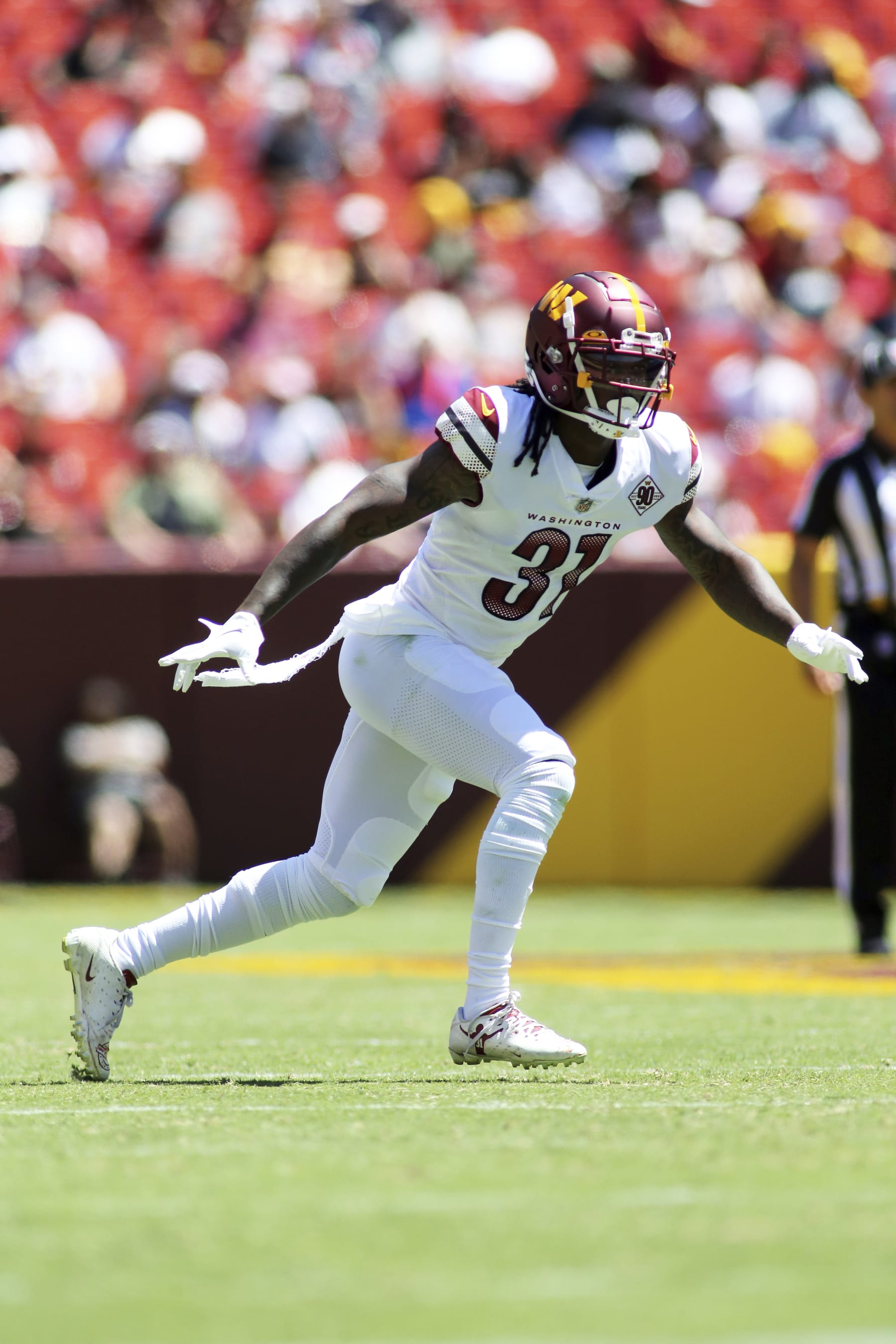 Washington Commanders safety Kamren Curl (31) runs during an NFL football game against the Carolina Panthers, Saturday, Aug. 13, 2022 in Landover. (AP Photo/Daniel Kucin Jr.)
