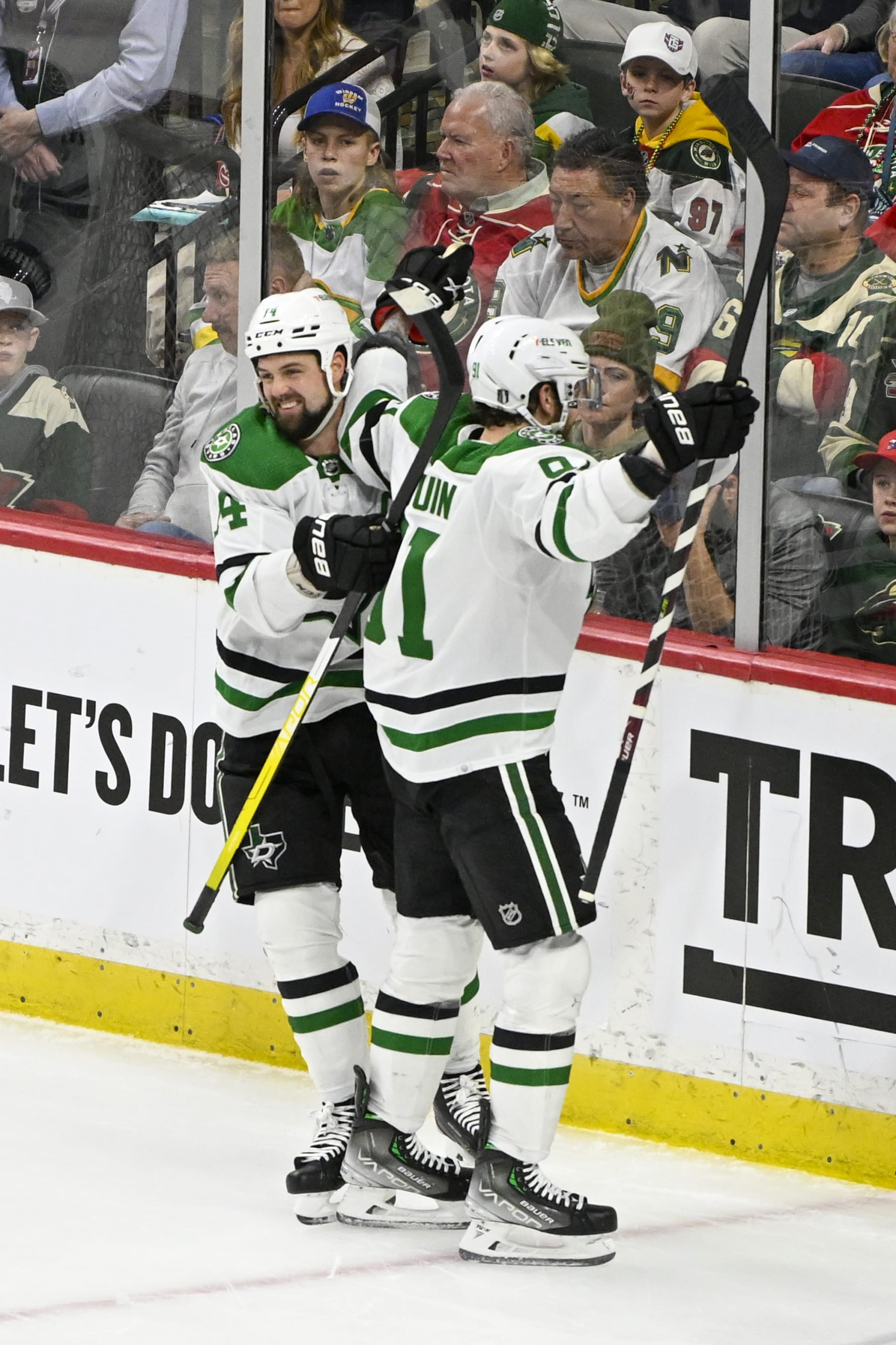 ST. PAUL, MN - APRIL 23: Dallas Stars Left Wing Jamie Benn (14) congratulates Dallas Stars Center Tyler Seguin (91) on his power play goal during the second period of Game Four of the First Round of the 2023 Stanley Cup Playoffs on April 23, 2023 at Xcel Energy Center in St. Paul, MN.(Photo by Nick Wosika/Icon Sportswire via Getty Images)