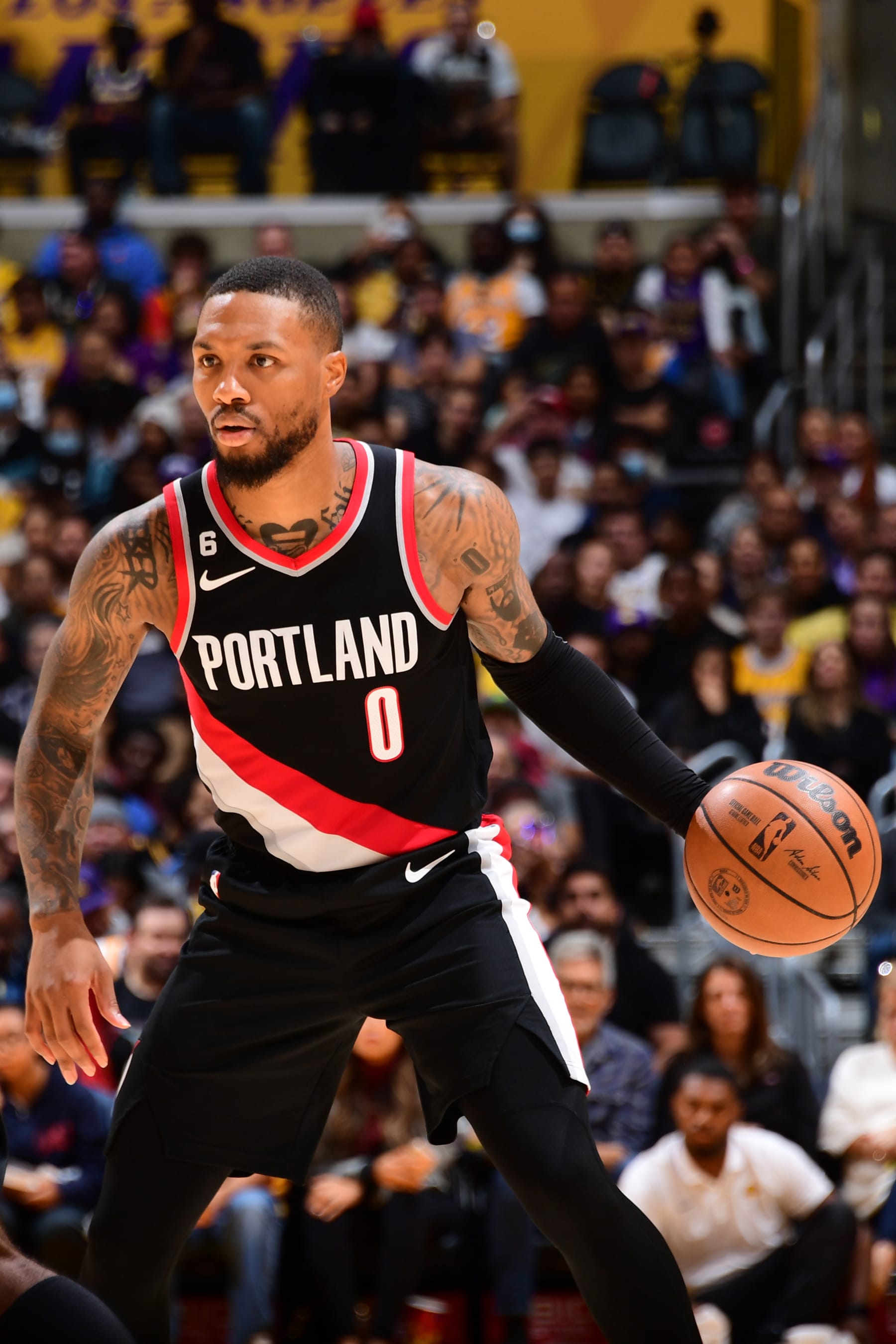 LOS ANGELES, CA - OCTOBER 23: Damian Lillard #0 of the Portland Trail Blazers dribbles the ball during the game against the Los Angeles Lakers on October 23, 2022 at Crypto.Com Arena in Los Angeles, California. NOTE TO USER: User expressly acknowledges and agrees that, by downloading and/or using this Photograph, user is consenting to the terms and conditions of the Getty Images License Agreement. Mandatory Copyright Notice: Copyright 2022 NBAE (Photo by Adam Pantozzi/NBAE via Getty Images)