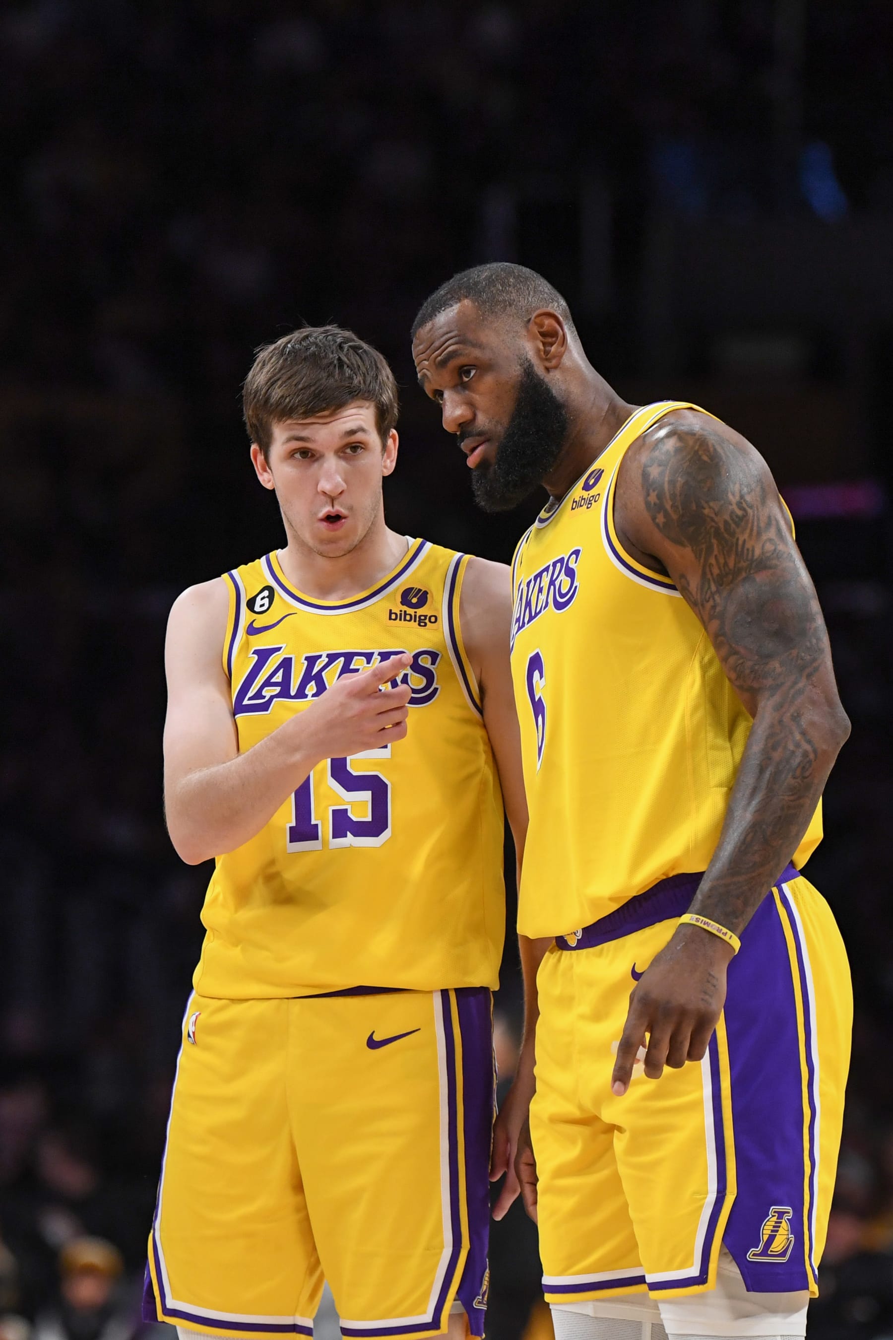 LOS ANGELES, CA - MAY 8:  Austin Reaves #15 & LeBron James #6 of the Los Angeles Lakers looks on during the game during  round two game four of the 2023 NBA Playoffs on May 8, 2023 at Chase Center in Los Angeles, California. NOTE TO USER: User expressly acknowledges and agrees that, by downloading and or using this photograph, user is consenting to the terms and conditions of Getty Images License Agreement. Mandatory Copyright Notice: Copyright 2023 NBAE (Photo by Noah Graham/NBAE via Getty Images)