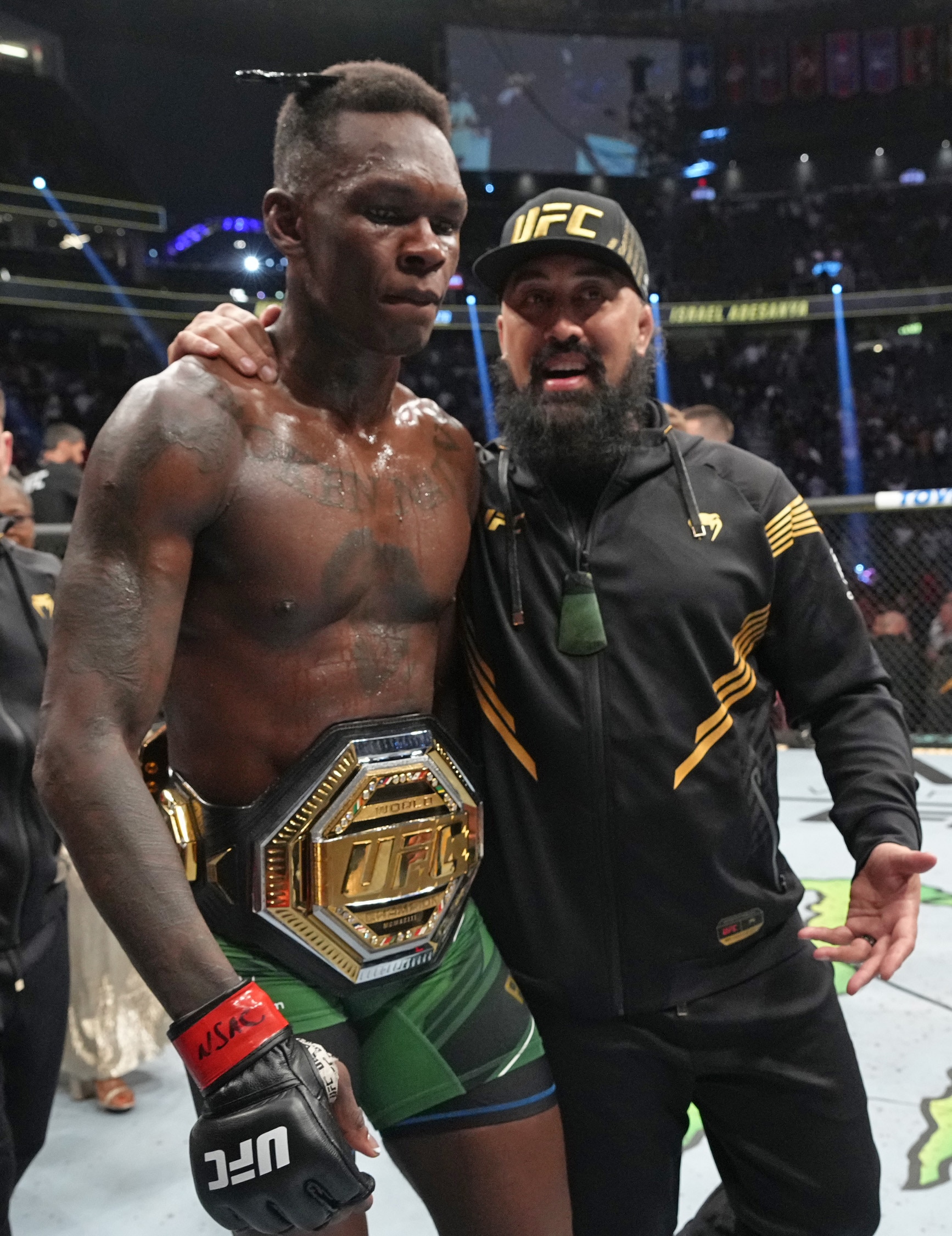 LAS VEGAS, NEVADA - JULY 02: Israel Adesanya of Nigeria reacts to his win over Jared Cannonier in the UFC middleweight championship fight during the UFC 276 event at T-Mobile Arena on July 02, 2022 in Las Vegas, Nevada. (Photo by Jeff Bottari/Zuffa LLC)