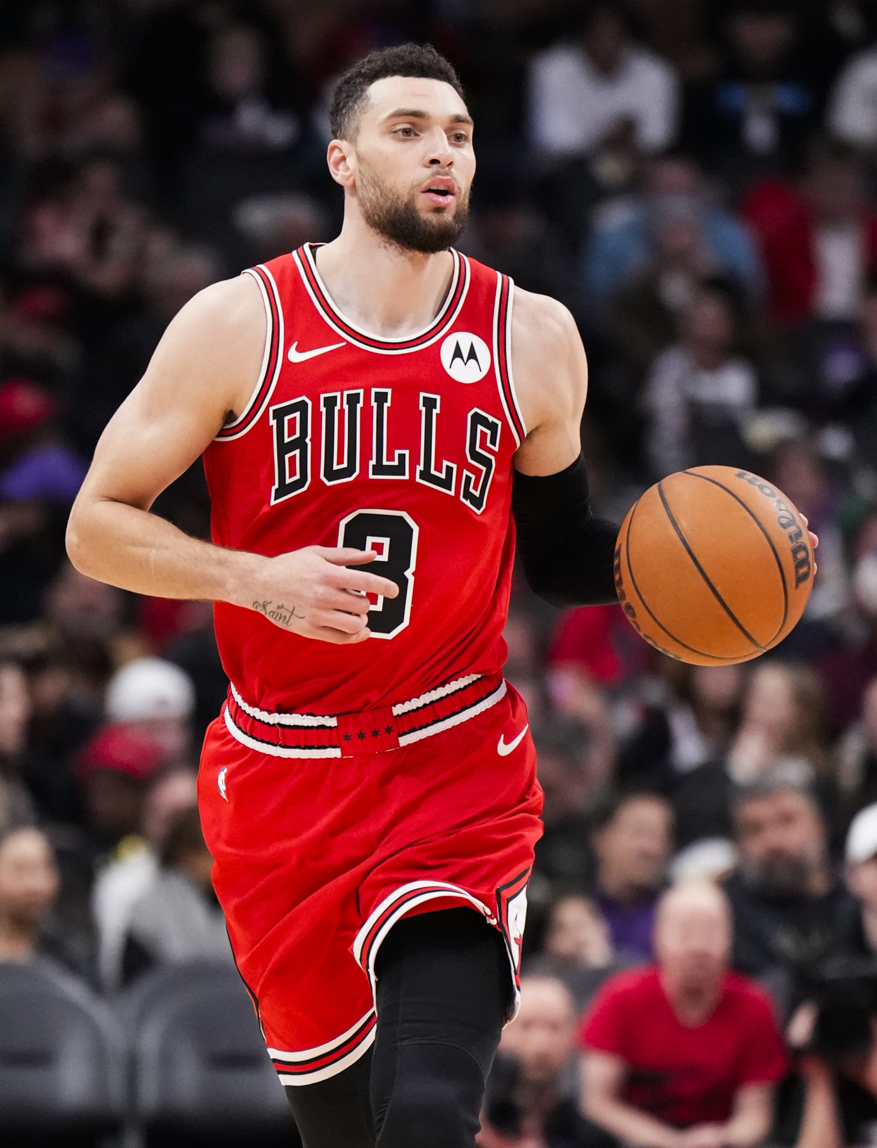 TORONTO, ON - JANUARY 18: Zach LaVine #8 of the Chicago Bulls dribbles against the Toronto Raptors during the second half of their basketball game at the Scotiabank Arena on January 18, 2024 in Toronto, Ontario, Canada. NOTE TO USER: User expressly acknowledges and agrees that, by downloading and/or using this Photograph, user is consenting to the terms and conditions of the Getty Images License Agreement. (Photo by Mark Blinch/Getty Images)