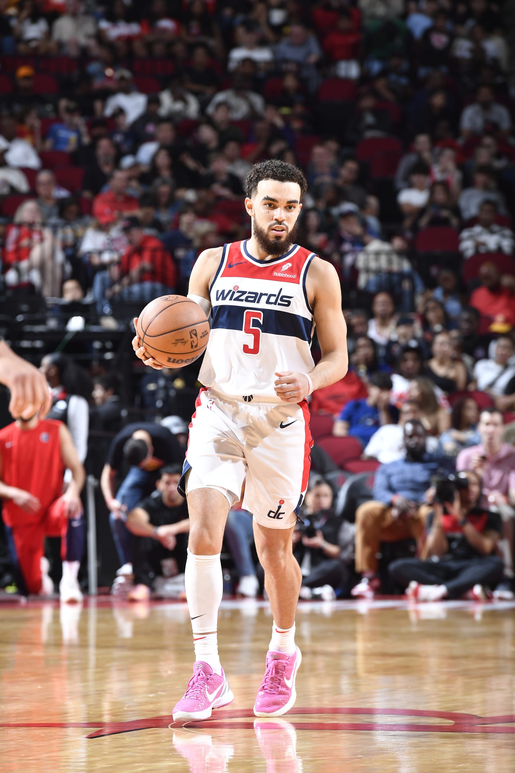 HOUSTON, TX - MARCH 14: Tyus Jones #5 of the Washington Wizards handles the ball during the game against the Houston Rockets on March 14, 2024 at the Toyota Center in Houston, Texas. NOTE TO USER: User expressly acknowledges and agrees that, by downloading and or using this photograph, User is consenting to the terms and conditions of the Getty Images License Agreement. Mandatory Copyright Notice: Copyright 2024 NBAE (Photo by Logan Riely/NBAE via Getty Images)