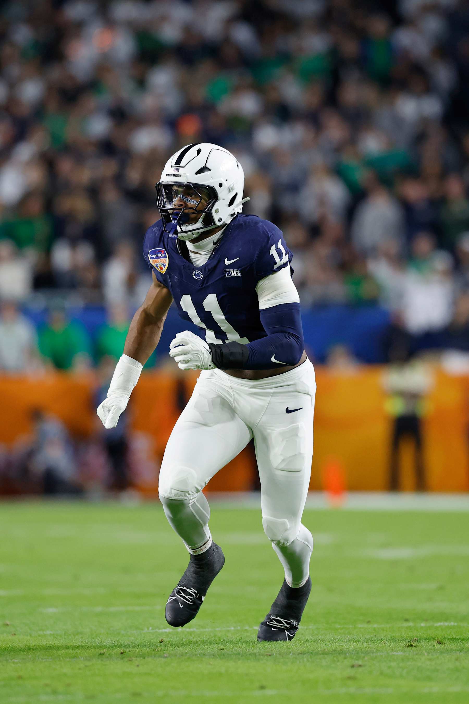 MIAMI GARDENS, FL - JANUARY 09: Edge Rusher Abdul Carter #11 of the Penn State Nittany Lions rushes on defense during the Penn State Nittany Lions versus Notre Dame Fighting Irish College Football Playoff Semifinal at the Capital One Orange Bowl on January 9, 2025, at Hard Rock Stadium in Miami Gardens, Florida. (Photo by Joe Robbins/Icon Sportswire via Getty Images)