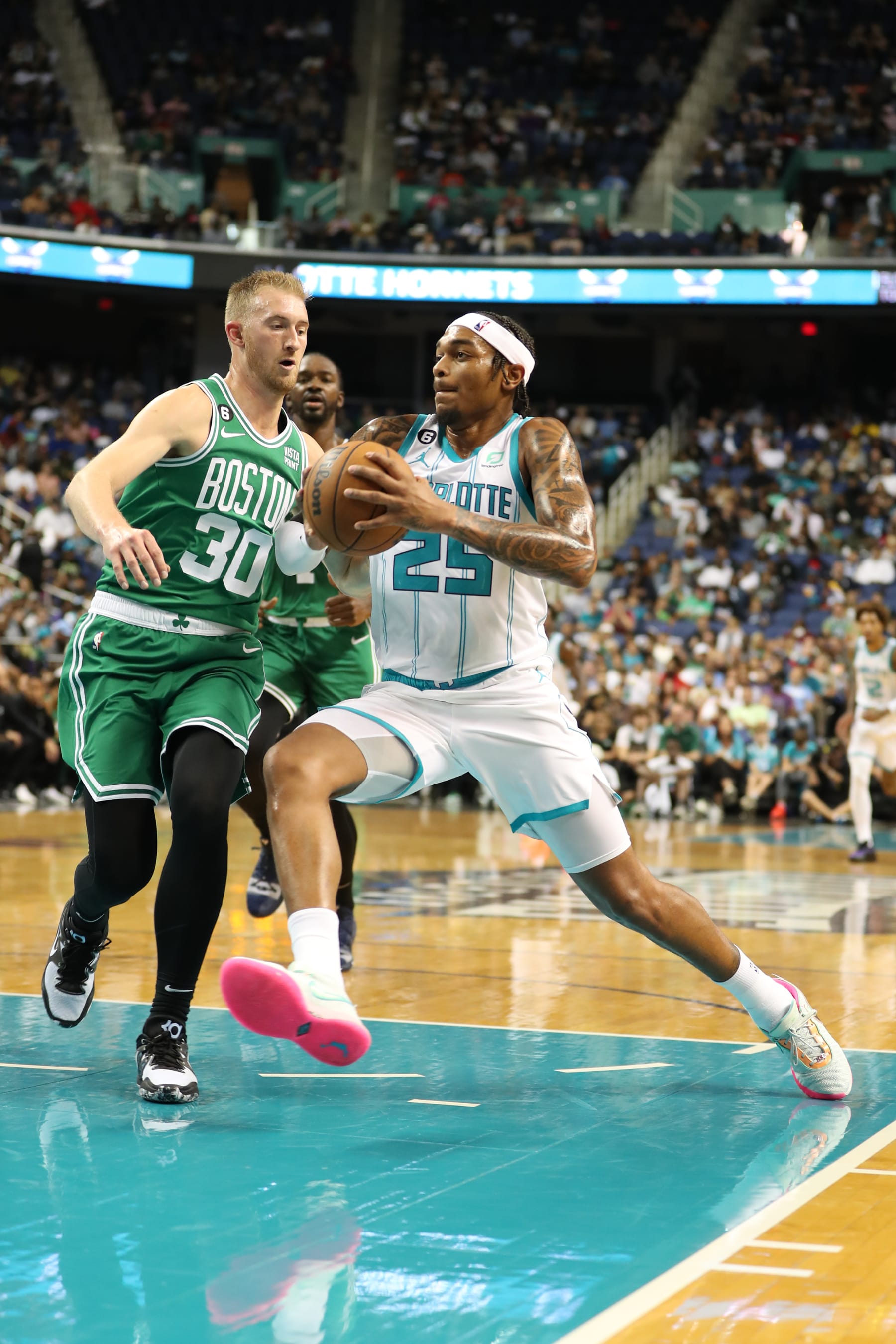 GREENSBORO, NC - OCTOBER 7: P.J. Washington #25 of the Charlotte Hornets drives to the basket during the game against the Boston Celtics on October 7, 2022 at Greensboro Coliseum Complex in Greensboro, North Carolina. NOTE TO USER: User expressly acknowledges and agrees that, by downloading and or using this photograph, User is consenting to the terms and conditions of the Getty Images License Agreement. Mandatory Copyright Notice: Copyright 2022 NBAE (Photo by Kent Smith/NBAE via Getty Images)