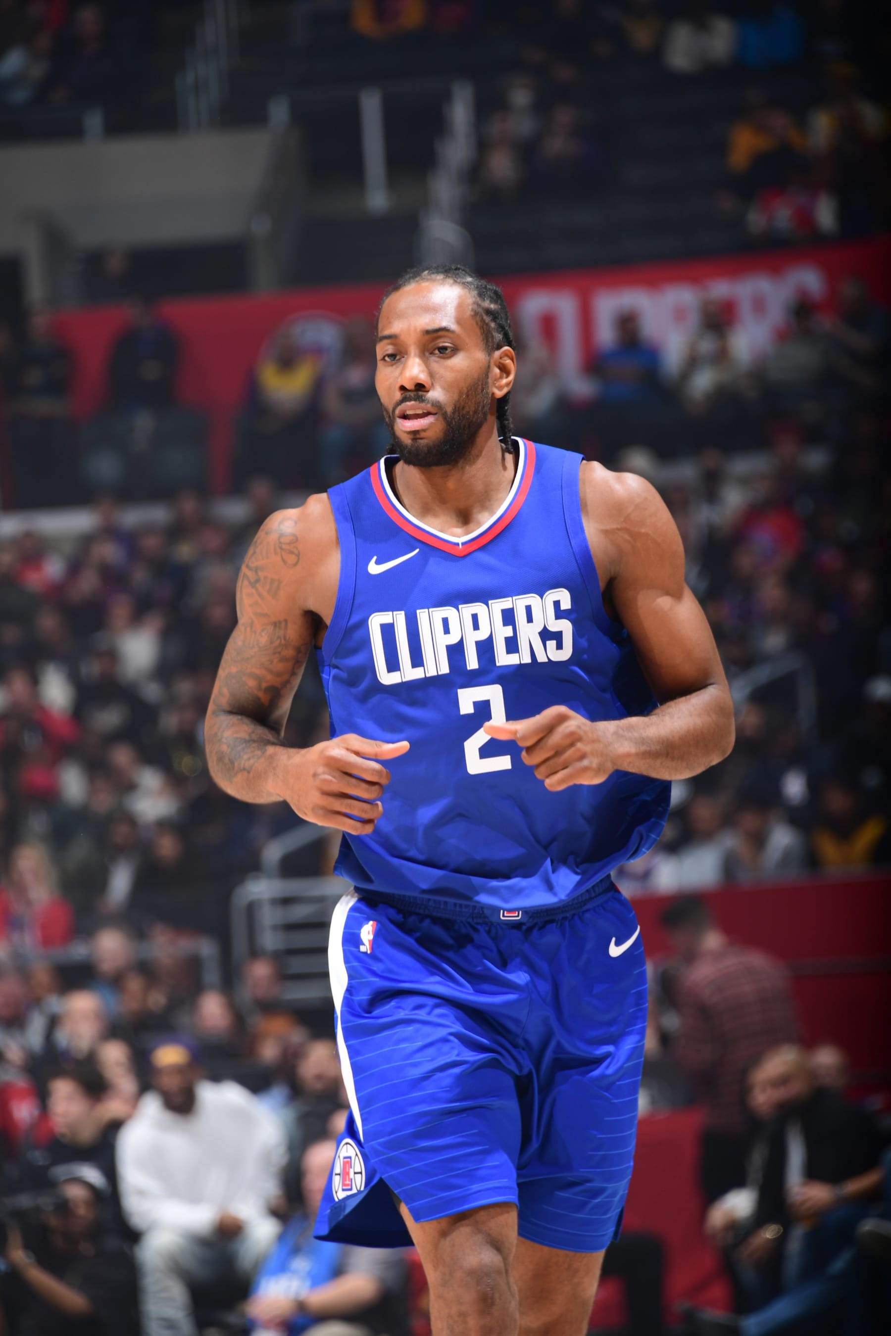 LOS ANGELES, CA - JANUARY 23:  Kawhi Leonard #2 of the LA Clippers look on during the game on January 23, 2024 at Crypto.Com Arena in Los Angeles, California. NOTE TO USER: User expressly acknowledges and agrees that, by downloading and/or using this Photograph, user is consenting to the terms and conditions of the Getty Images License Agreement. Mandatory Copyright Notice: Copyright 2024 NBAE (Photo by Adam Pantozzi/NBAE via Getty Images)