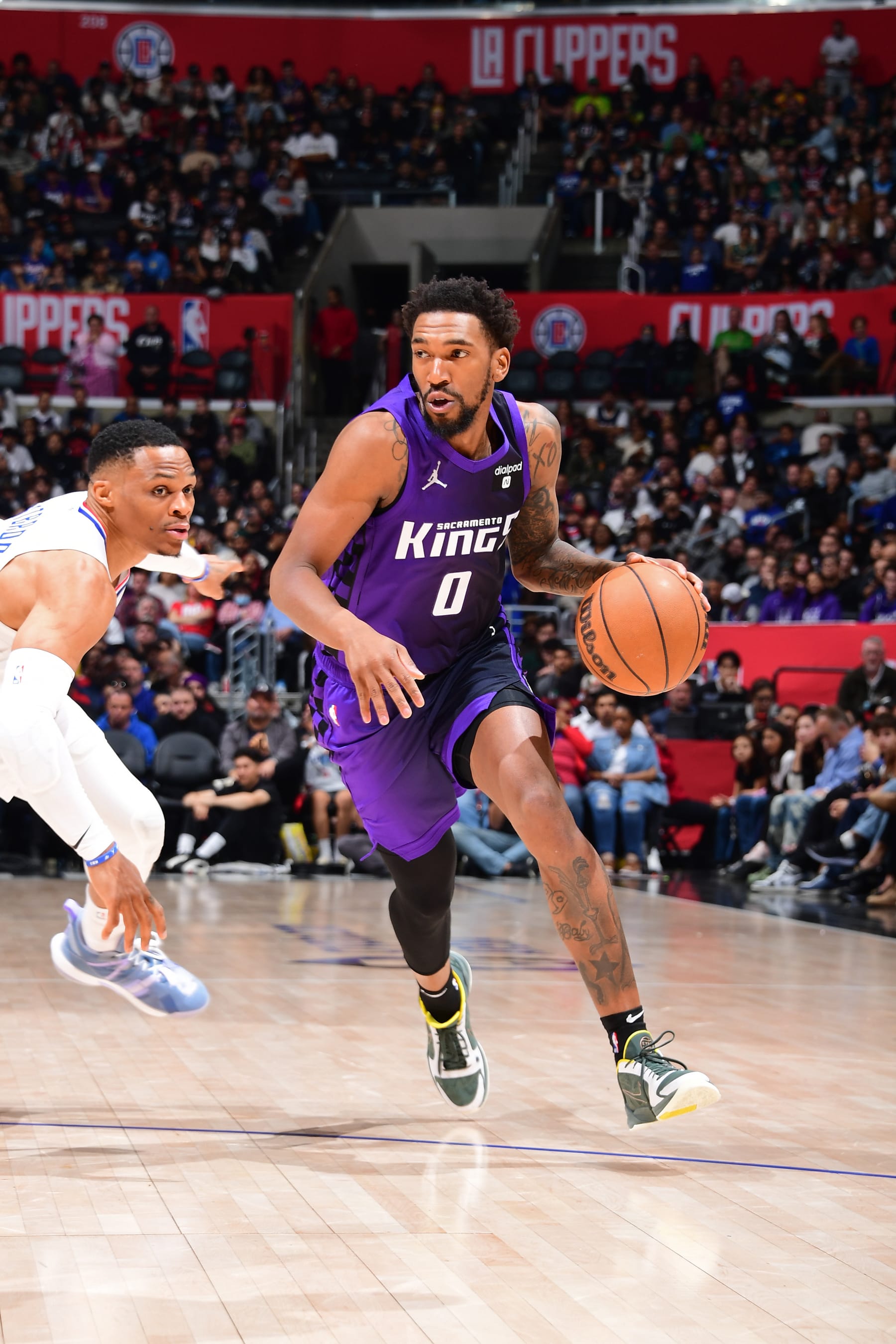 LOS ANGELES, CA - FEBRUARY 25: Malik Monk #0 of the Sacramento Kings dribbles the ball during the game against the LA Clippers on February 25, 2024 at Crypto.Com Arena in Los Angeles, California. NOTE TO USER: User expressly acknowledges and agrees that, by downloading and/or using this Photograph, user is consenting to the terms and conditions of the Getty Images License Agreement. Mandatory Copyright Notice: Copyright 2024 NBAE (Photo by Adam Pantozzi/NBAE via Getty Images)