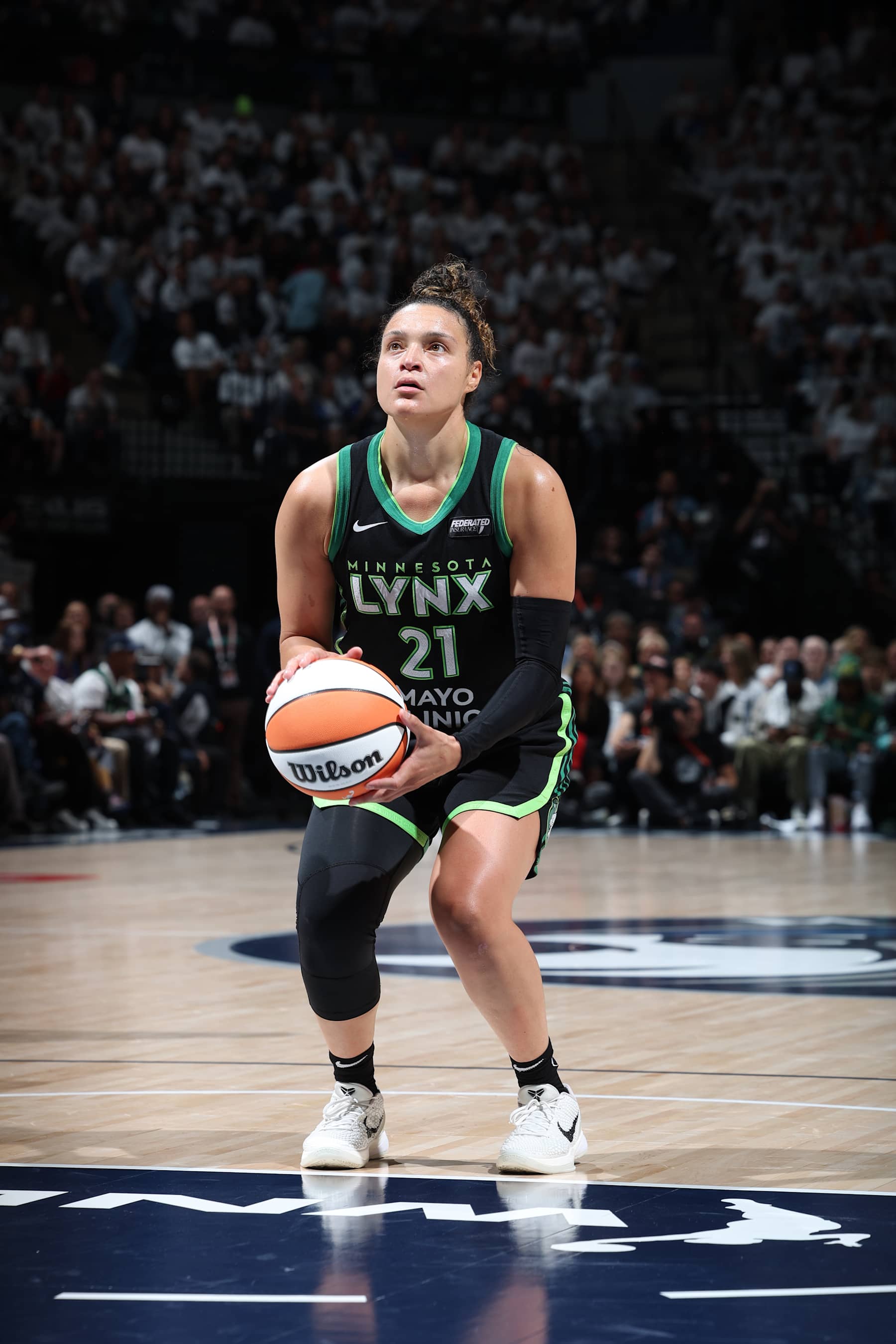 MINNEAPOLIS, MN - OCTOBER 18: Kayla McBride #21 of the Minnesota Lynx shoots a free throw during the game against the New York Liberty during Game 4 of the 2024 WNBA Finals on October 18, 2024 at Target Center in Minneapolis, Minnesota. NOTE TO USER: User expressly acknowledges and agrees that, by downloading and or using this Photograph, user is consenting to the terms and conditions of the Getty Images License Agreement. Mandatory Copyright Notice: Copyright 2024 NBAE (Photo by David Sherman/NBAE via Getty Images)
