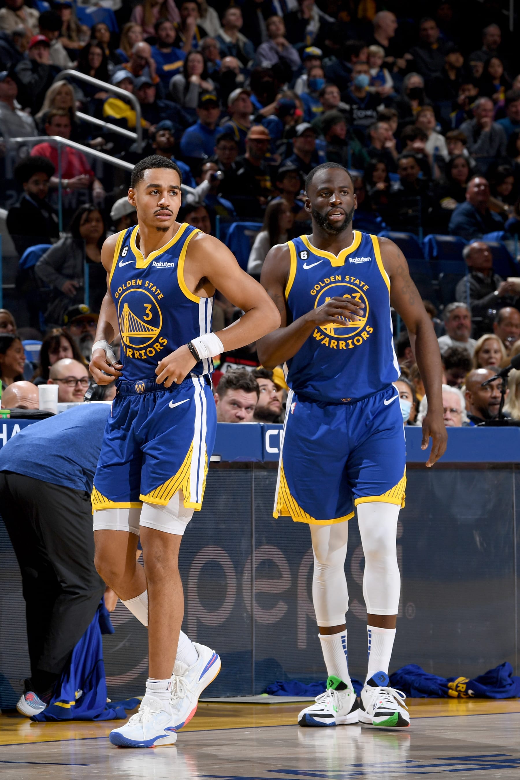 SAN FRANCISCO, CA - January 7: Jordan Poole #3 and Draymond Green #23 of the Golden State Warriors looks on during the game against the Orlando Magic  on JANUARY 7, 2023 at Chase Center in San Francisco, California. NOTE TO USER: User expressly acknowledges and agrees that, by downloading and or using this photograph, user is consenting to the terms and conditions of Getty Images License Agreement. Mandatory Copyright Notice: Copyright 2022 NBAE (Photo by Noah Graham/NBAE via Getty Images)
