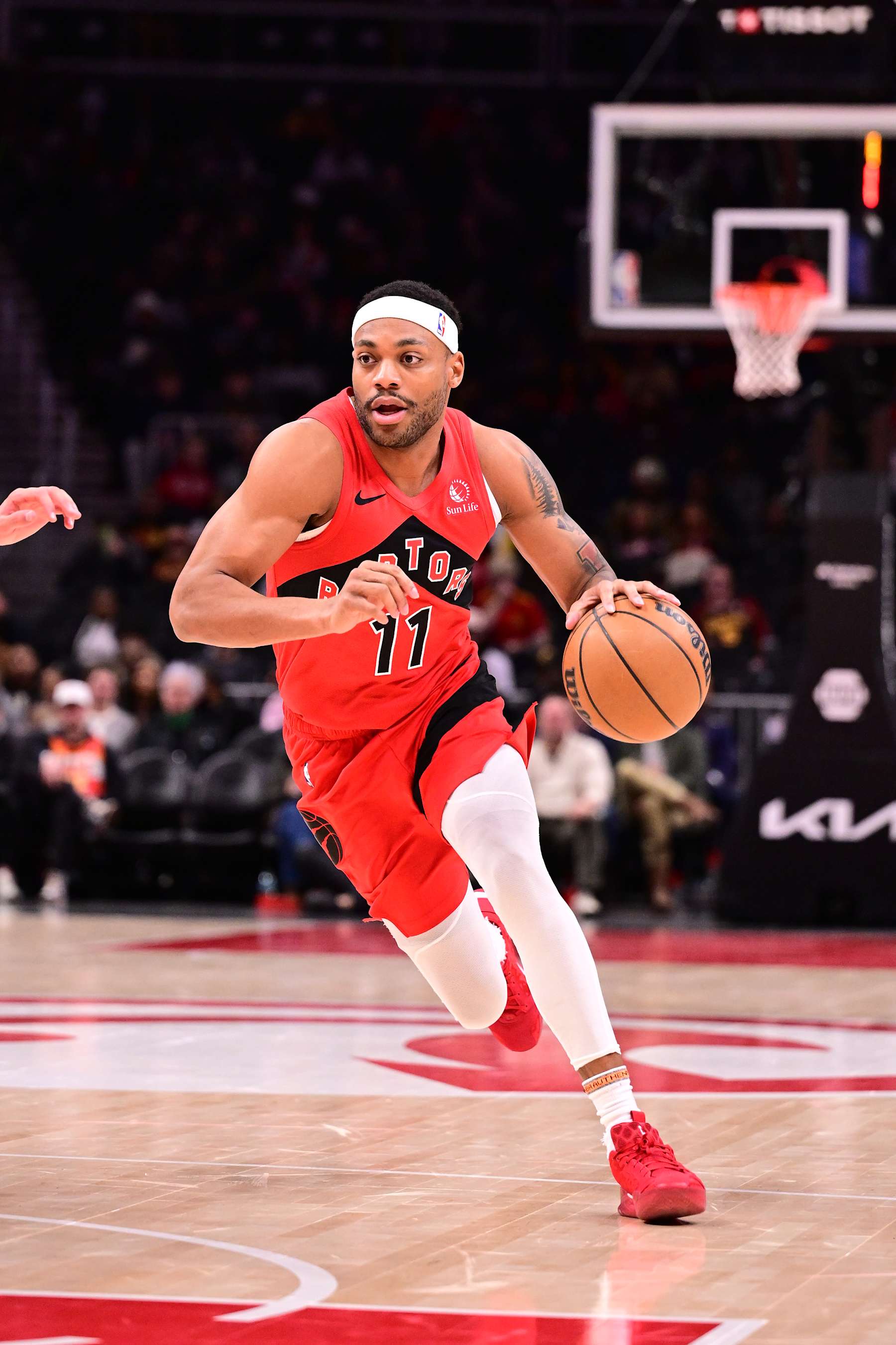 ATLANTA, GA - JANUARY 23:  Bruce Brown #11 of the Toronto Raptors dribbles the ball during the game against the Atlanta Hawks on January 23, 2025 at State Farm Arena in Atlanta, Georgia.  NOTE TO USER: User expressly acknowledges and agrees that, by downloading and/or using this Photograph, user is consenting to the terms and conditions of the Getty Images License Agreement. Mandatory Copyright Notice: Copyright 2025 NBAE (Photo by Adam Hagy/NBAE via Getty Images)