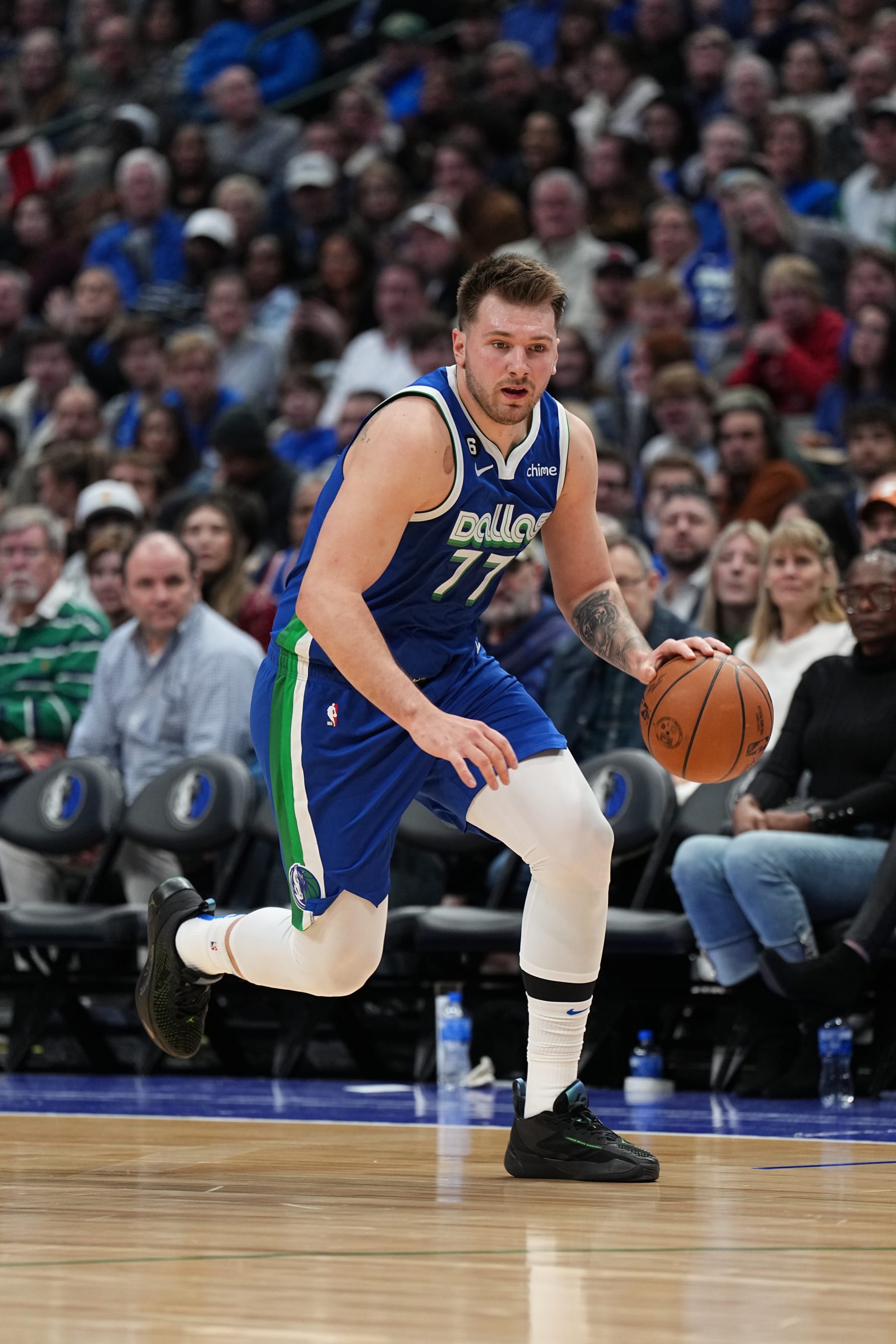 DALLAS, TX - DECEMBER 27: Luka Doncic #77 of the Dallas Mavericks drives to the basket during the game against New York Knicks on December 27, 2022 at the American Airlines Center in Dallas, Texas. NOTE TO USER: User expressly acknowledges and agrees that, by downloading and or using this photograph, User is consenting to the terms and conditions of the Getty Images License Agreement. Mandatory Copyright Notice: Copyright 2022 NBAE (Photo by Glenn James/NBAE via Getty Images)