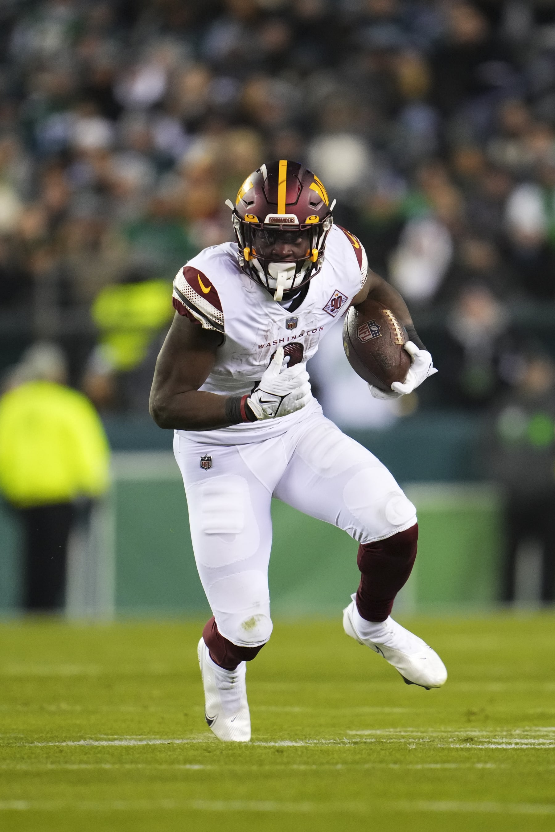 PHILADELPHIA, PA - NOVEMBER 14: Brian Robinson Jr. #8 of the Washington Commanders runs the ball against the Philadelphia Eagles at Lincoln Financial Field on November 14, 2022 in Philadelphia. (Photo by Cooper Neill/Getty Images) PHILADELPHIA, PA - NOVEMBER 14: Brian Robinson Jr. #8 of the Washington Commanders runs the ball against the Philadelphia Eagles at Lincoln Financial Field on November 14, 2022 in Philadelphia. (Photo by Cooper Neill/Getty Images)