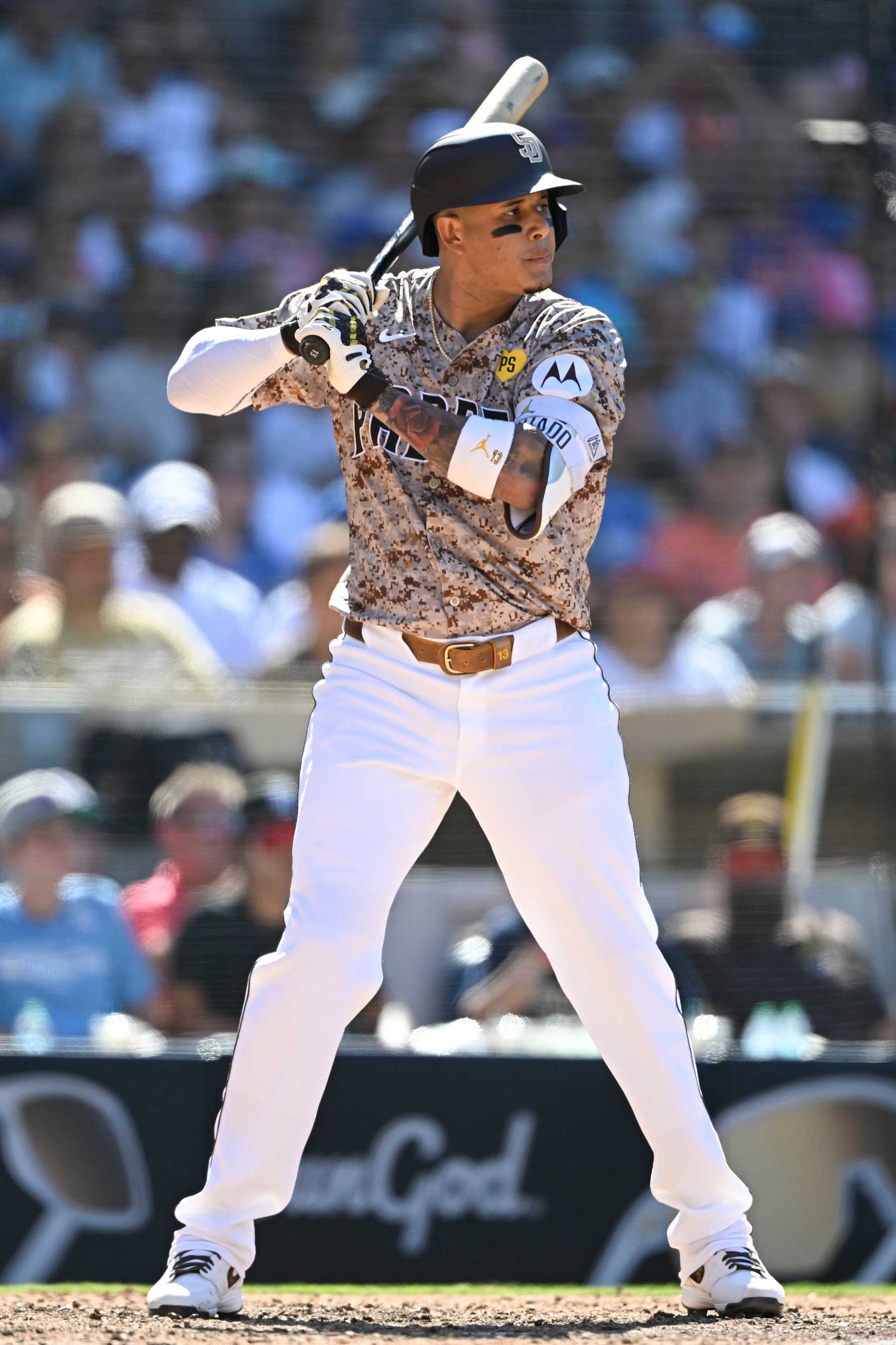 SAN DIEGO, CA - AUGUST 25: Manny Machado #13 of the San Diego Padres bats during a baseball game against the New York Mets August 25, 2024 at Petco Park in San Diego, California. (Photo by Denis Poroy/Getty Images)