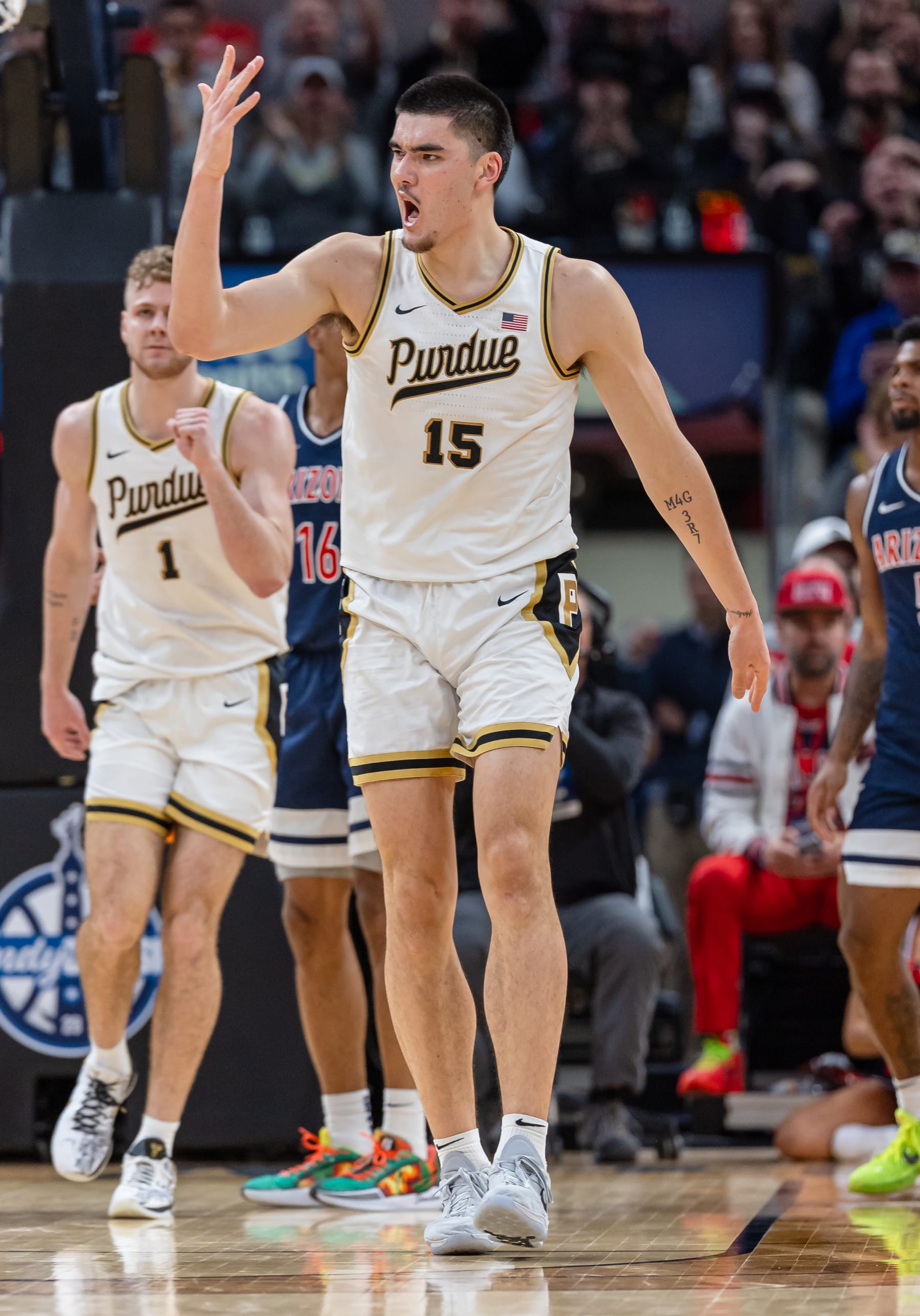 INDIANAPOLIS, INDIANA - DECEMBER 16: Zach Edey #15 of the Purdue Boilermakers reacts during the first half against the Arizona Wildcats in the Indy Classic at Gainbridge Fieldhouse on December 16, 2023 in Indianapolis, Indiana. (Photo by Michael Hickey/Getty Images)