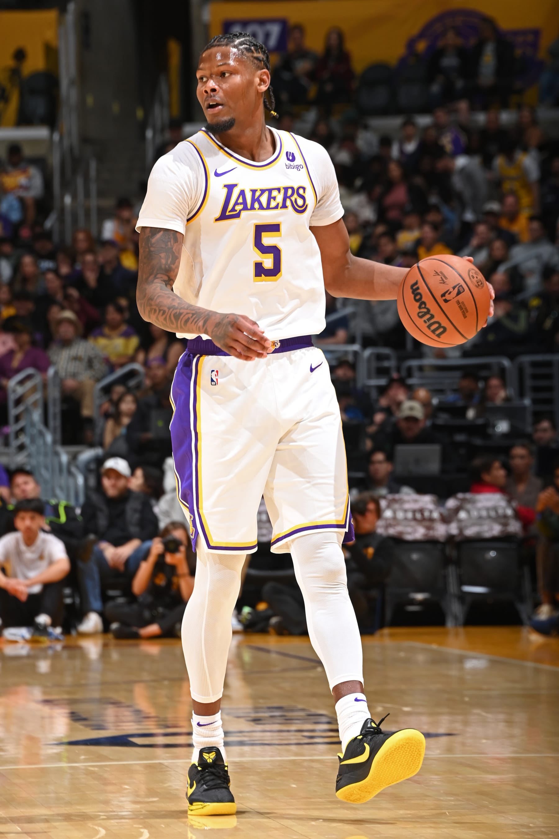 LOS ANGELES, CA - NOVEMBER 12: Cam Reddish #5 of the Los Angeles Lakers handles the ball during the game against the Portland Trail Blazers on November 12, 2023 at Crypto.Com Arena in Los Angeles, California. NOTE TO USER: User expressly acknowledges and agrees that, by downloading and/or using this Photograph, user is consenting to the terms and conditions of the Getty Images License Agreement. Mandatory Copyright Notice: Copyright 2023 NBAE (Photo by Andrew D. Bernstein/NBAE via Getty Images)