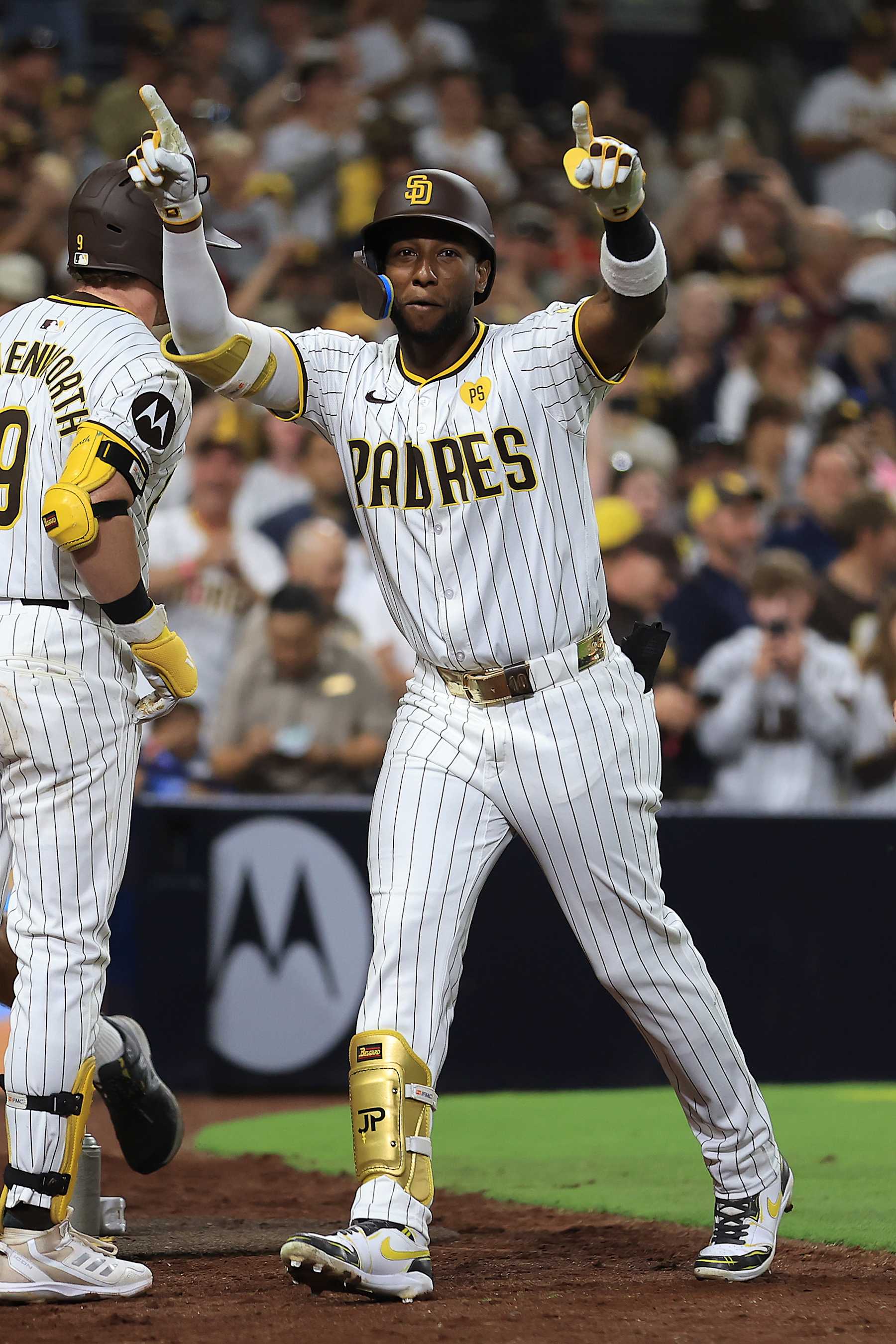SAN DIEGO, CALIFORNIA - JUNE 25: Jurickson Profar #10 of the San Diego Padres reacts after hitting a grand slam during the sixth inning of a game against the Washington Nationals at Petco Park on June 25, 2024 in San Diego, California. (Photo by Sean M. Haffey/Getty Images)