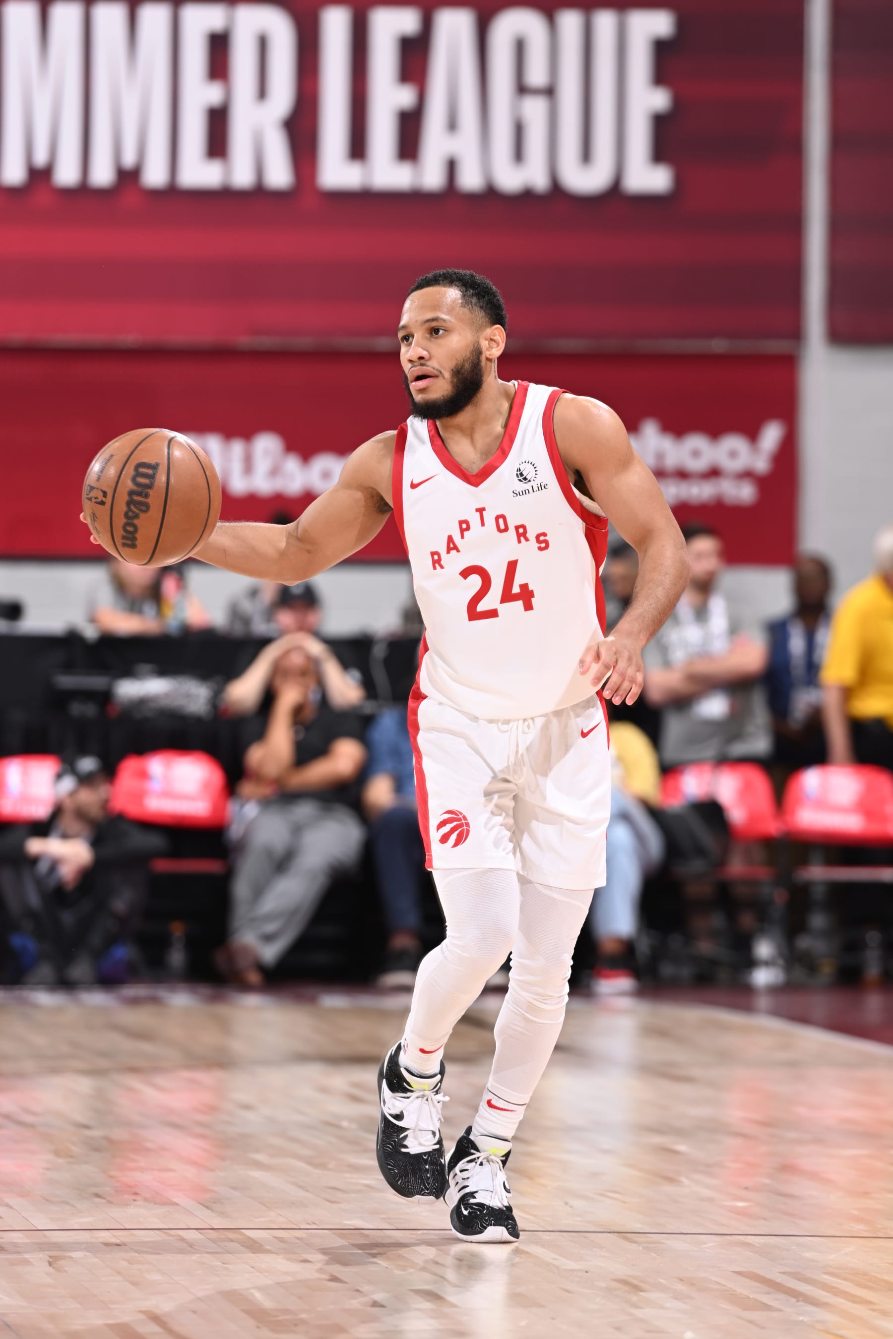 LAS VEGAS, NV - JULY 7: Markquis Nowell #24 of the Toronto Raptors dribbles the ball during the game against the Chicago Bulls during the 2023 NBA Las Vegas Summer League on July 7, 2023 at the Cox Pavilion in Las Vegas, Nevada. NOTE TO USER: User expressly acknowledges and agrees that, by downloading and or using this photograph, User is consenting to the terms and conditions of the Getty Images License Agreement. Mandatory Copyright Notice: Copyright 2023 NBAE (Photo by Logan Riely/NBAE via Getty Images)