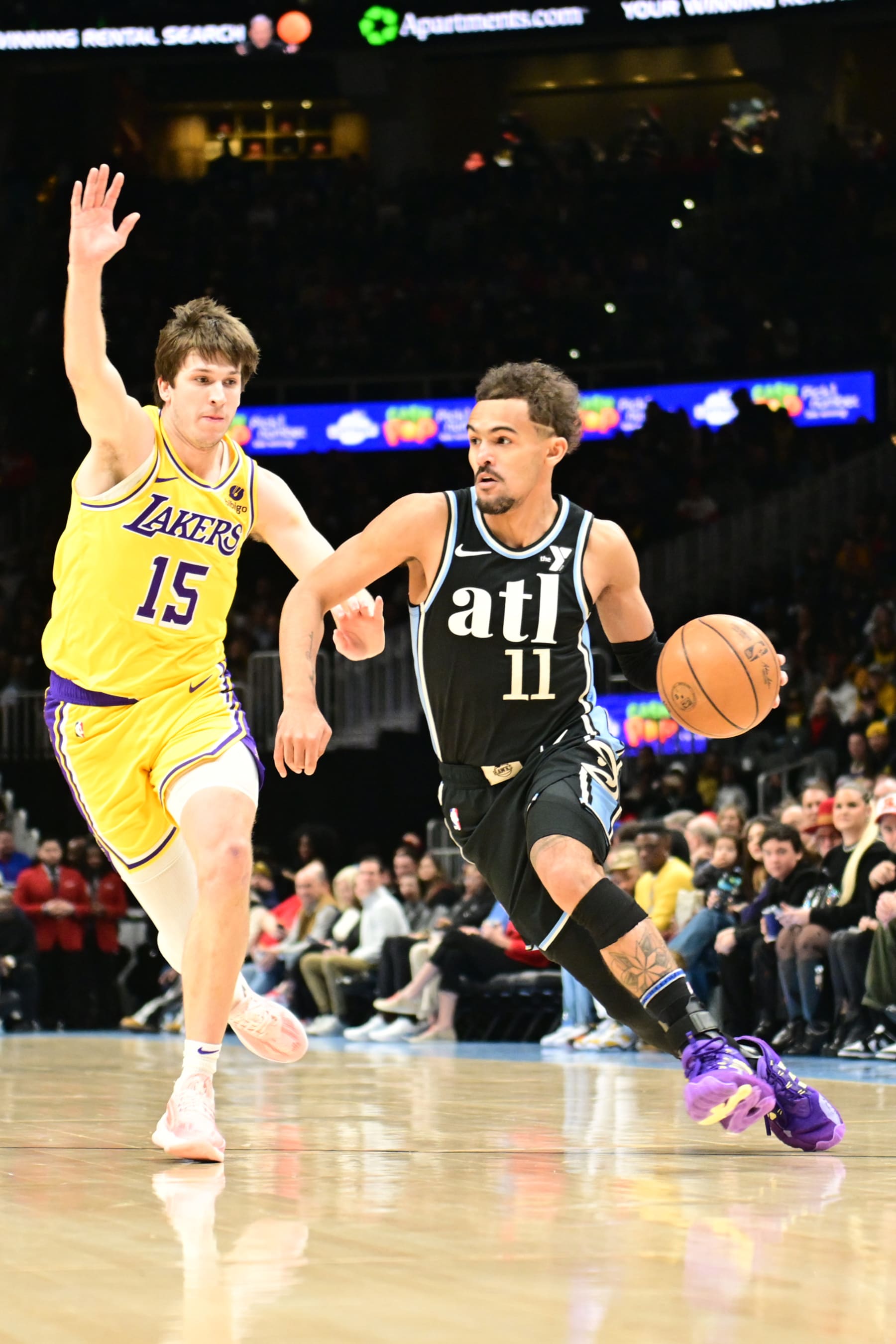 ATLANTA, GA - JANUARY 30: Trae Young #11 of the Atlanta Hawks handles the ball during the game  against the Los Angeles Lakers on January 30, 2024 at State Farm Arena in Atlanta, Georgia.  NOTE TO USER: User expressly acknowledges and agrees that, by downloading and/or using this Photograph, user is consenting to the terms and conditions of the Getty Images License Agreement. Mandatory Copyright Notice: Copyright 2024 NBAE (Photo by Adam Hagy/NBAE via Getty Images)