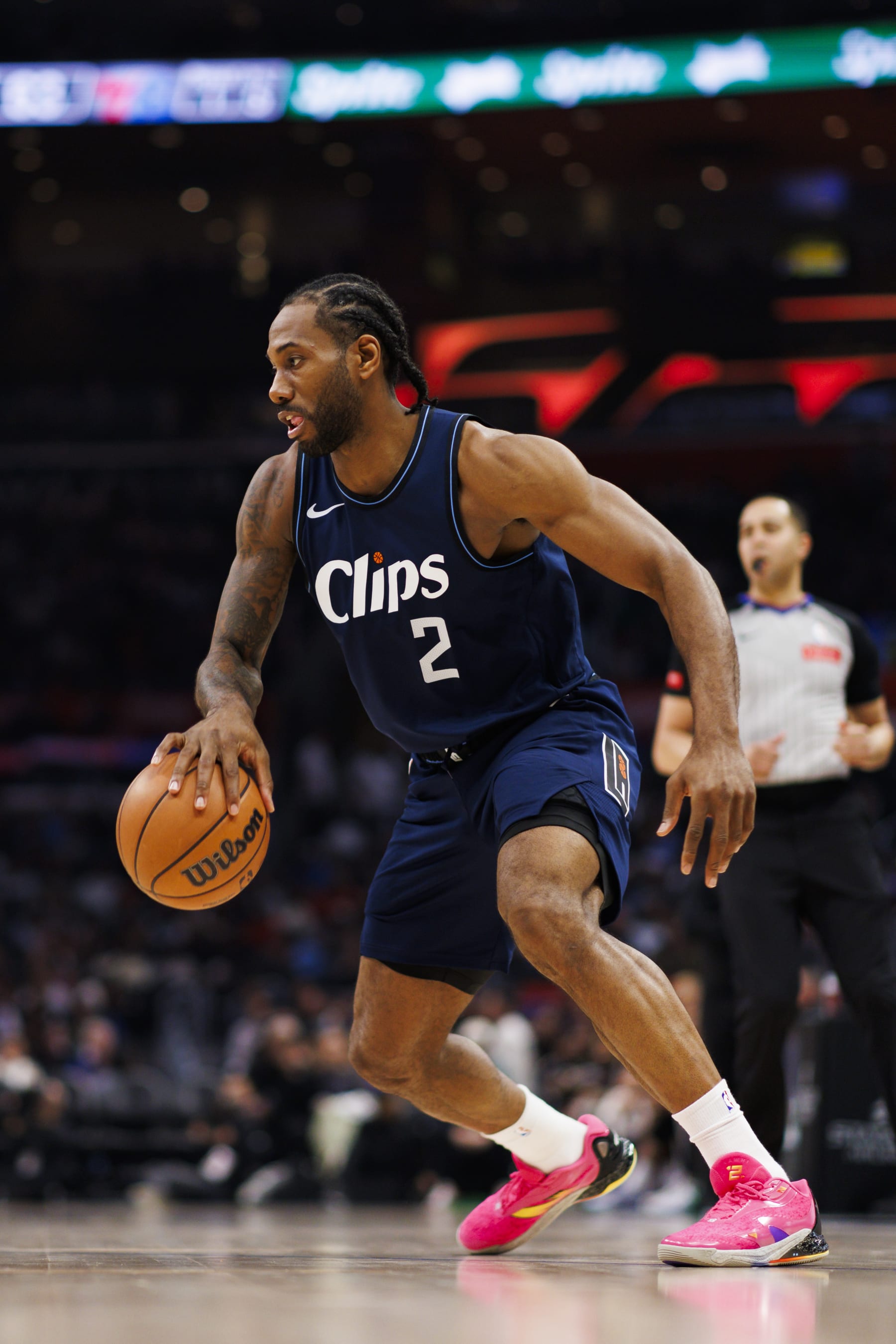 LOS ANGELES, CA - MARCH 24: LA Clippers forward Kawhi Leonard (2) dribbles during an NBA basketball game game against the Philadelphia 76ers on March 24, 2024 at Crypto.com Arena in Los Angeles, CA. (Photo by Ric Tapia/Icon Sportswire via Getty Images)