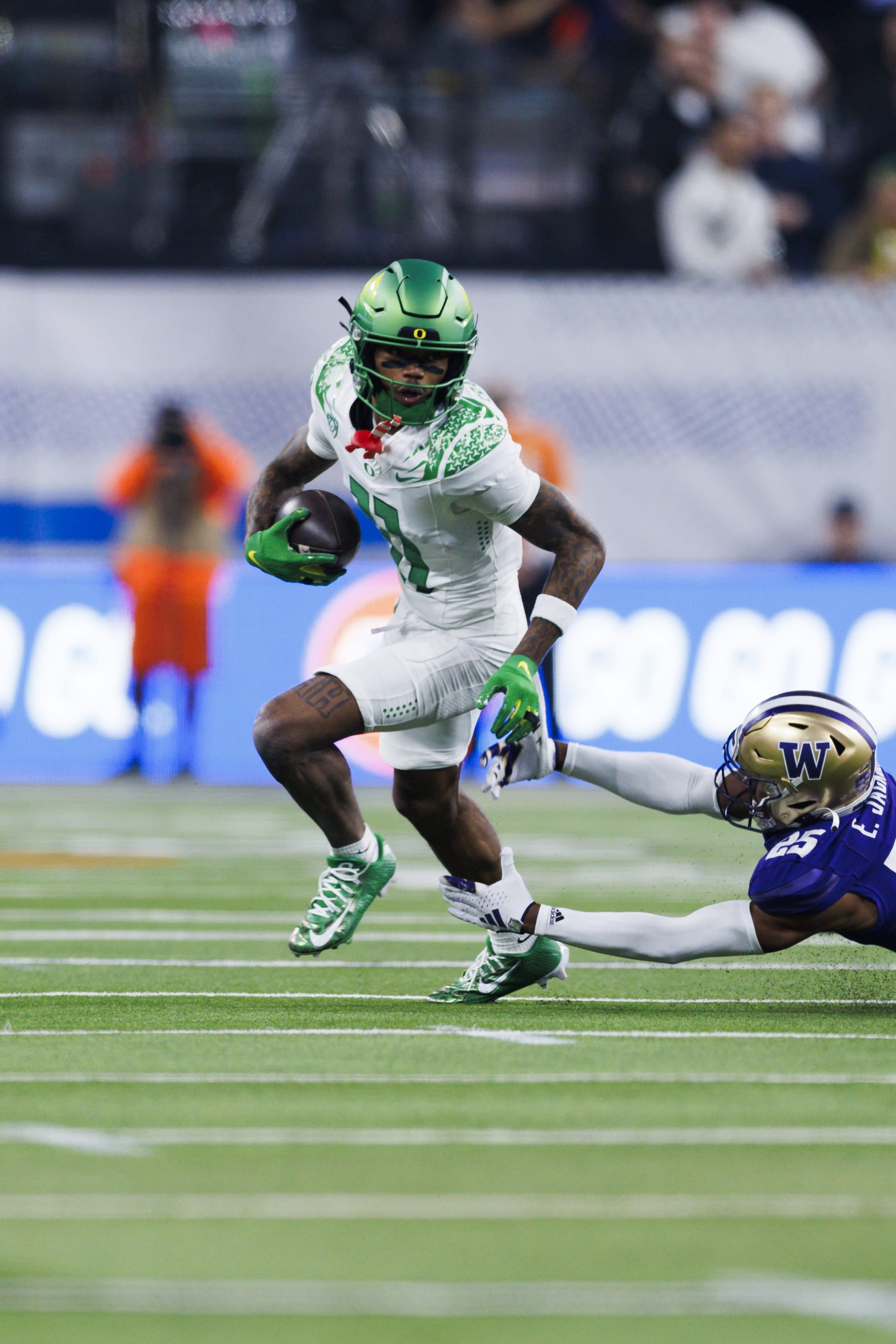 LAS VEGAS, NEVADA - DECEMBER 1: Troy Franklin #11 of the Oregon Ducks runs a route against the Washington Huskies during the Pac-12 Championship at Allegiant Stadium on December 1, 2023 in Las Vegas, Nevada. (Photo by Ric Tapia/Getty Images)