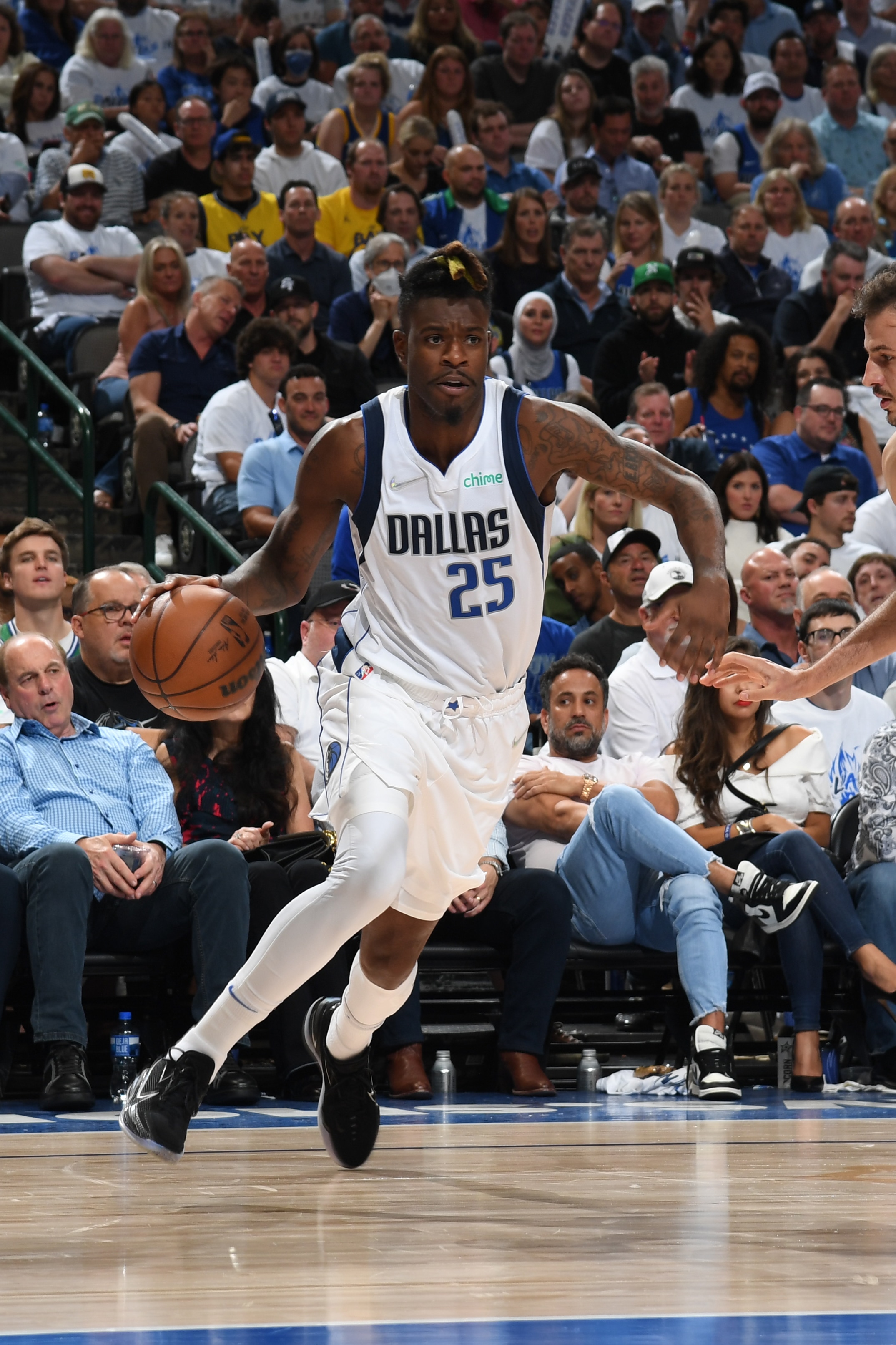 DALLAS, TX - MAY 24: Reggie Bullock #25 of the Dallas Mavericks drives to the basket against the Golden State Warriors during Game 4 of the 2022 NBA Playoffs Western Conference Finals  on May 24, 2022 at the American Airlines Center in Dallas, Texas. NOTE TO USER: User expressly acknowledges and agrees that, by downloading and or using this photograph, User is consenting to the terms and conditions of the Getty Images License Agreement. Mandatory Copyright Notice: Copyright 2022 NBAE (Photo by Noah Graham/NBAE via Getty Images)