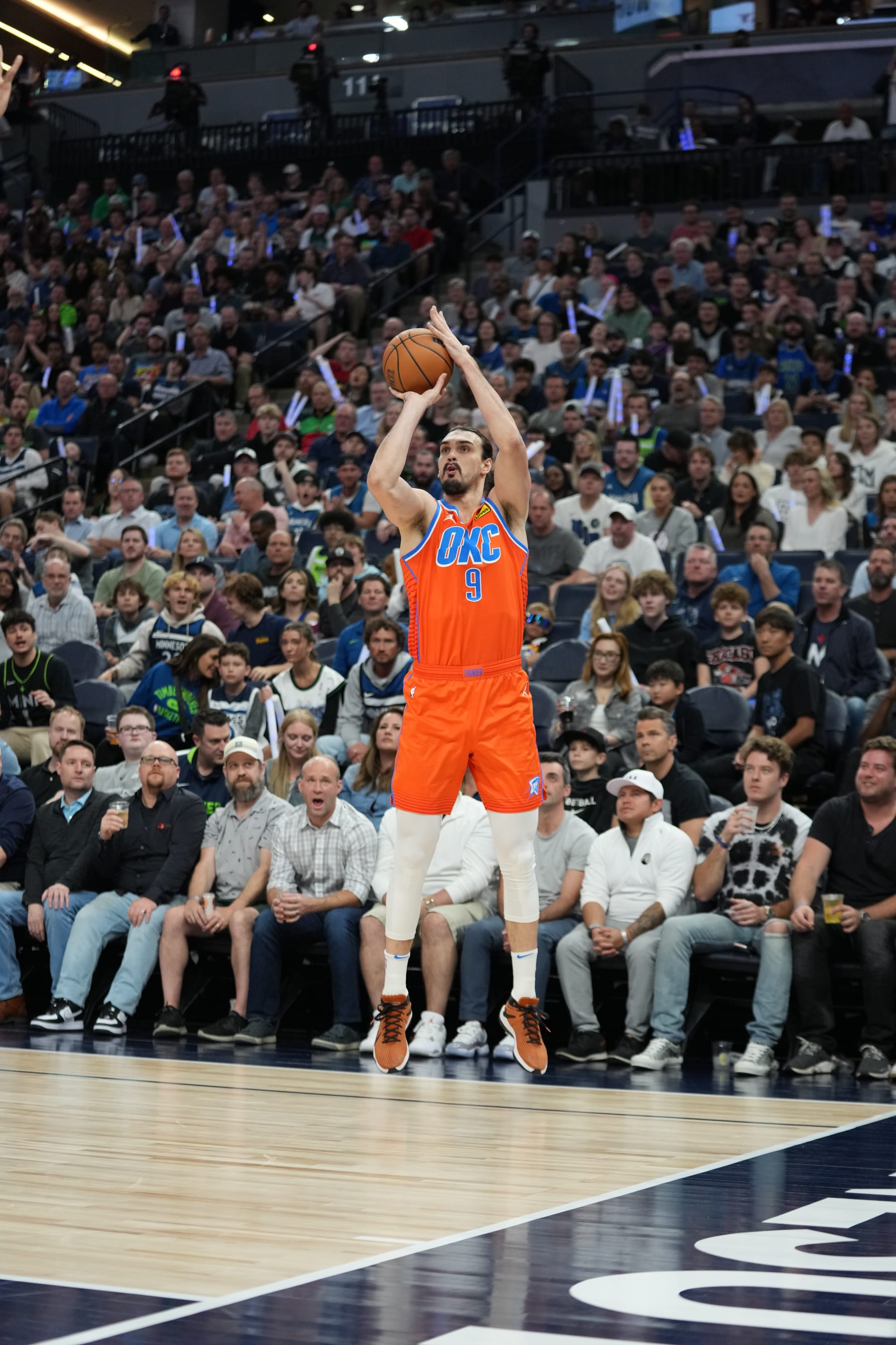 MINNEAPOLIS, MN -  APRIL 14: Dario Saric #9 of the Oklahoma City Thunder shoots a three point basket during the 2023 Play-In Tournament against the Minnesota Timberwolves on April 14, 2023 at Target Center in Minneapolis, Minnesota. NOTE TO USER: User expressly acknowledges and agrees that, by downloading and or using this Photograph, user is consenting to the terms and conditions of the Getty Images License Agreement. Mandatory Copyright Notice: Copyright 2023 NBAE (Photo by Jordan Johnson/NBAE via Getty Images)