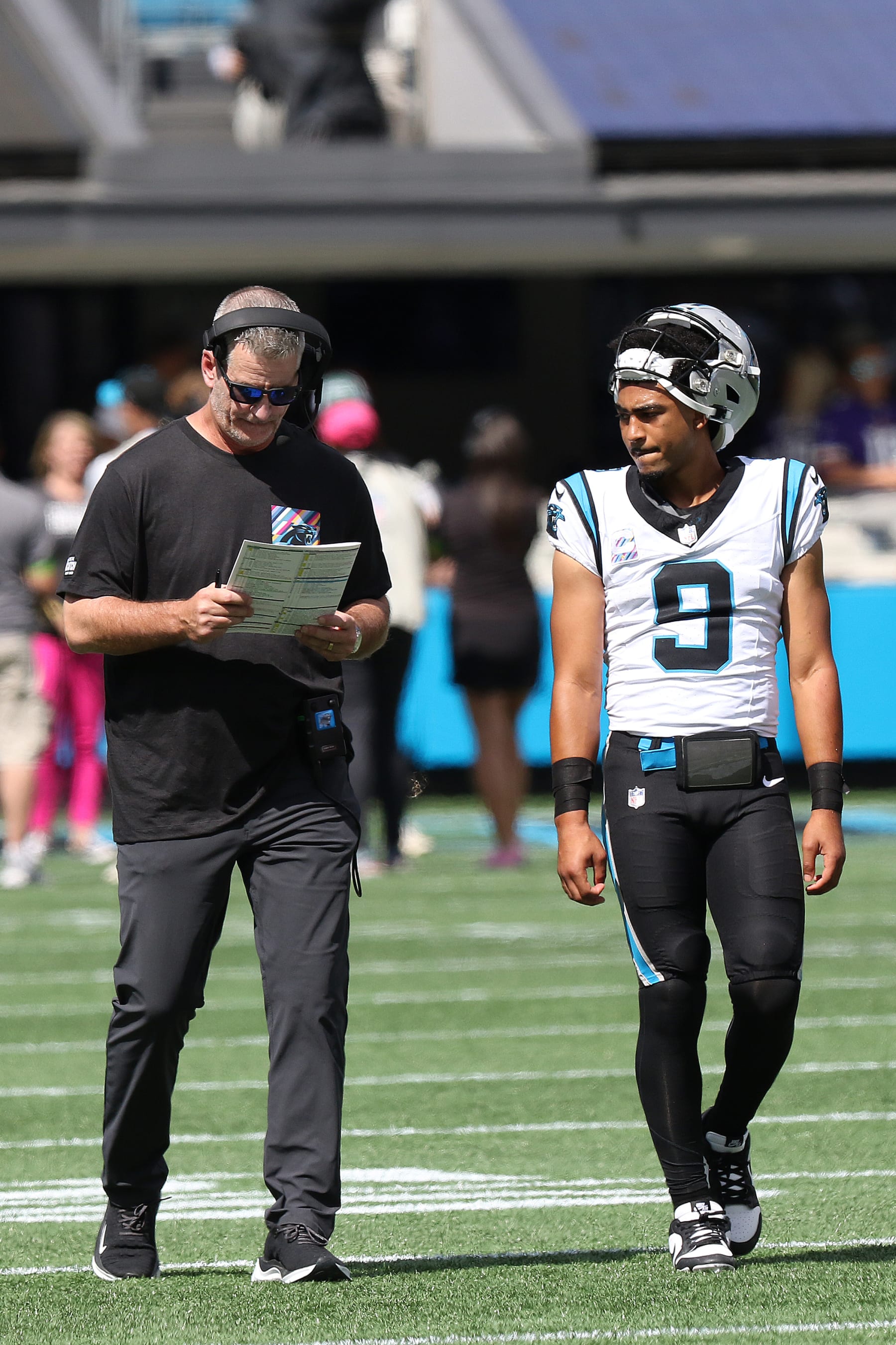 CHARLOTTE, NC - OCTOBER 01: Carolina Panthers head coach Frank Reich and Carolina Panthers quarterback Bryce Young (9) during an NFL football game between the Minnesota Vikings and the Carolina Panthers on October 1, 2023 at Bank of America Stadium in Charlotte, N.C. (Photo by John Byrum/Icon Sportswire via Getty Images)
