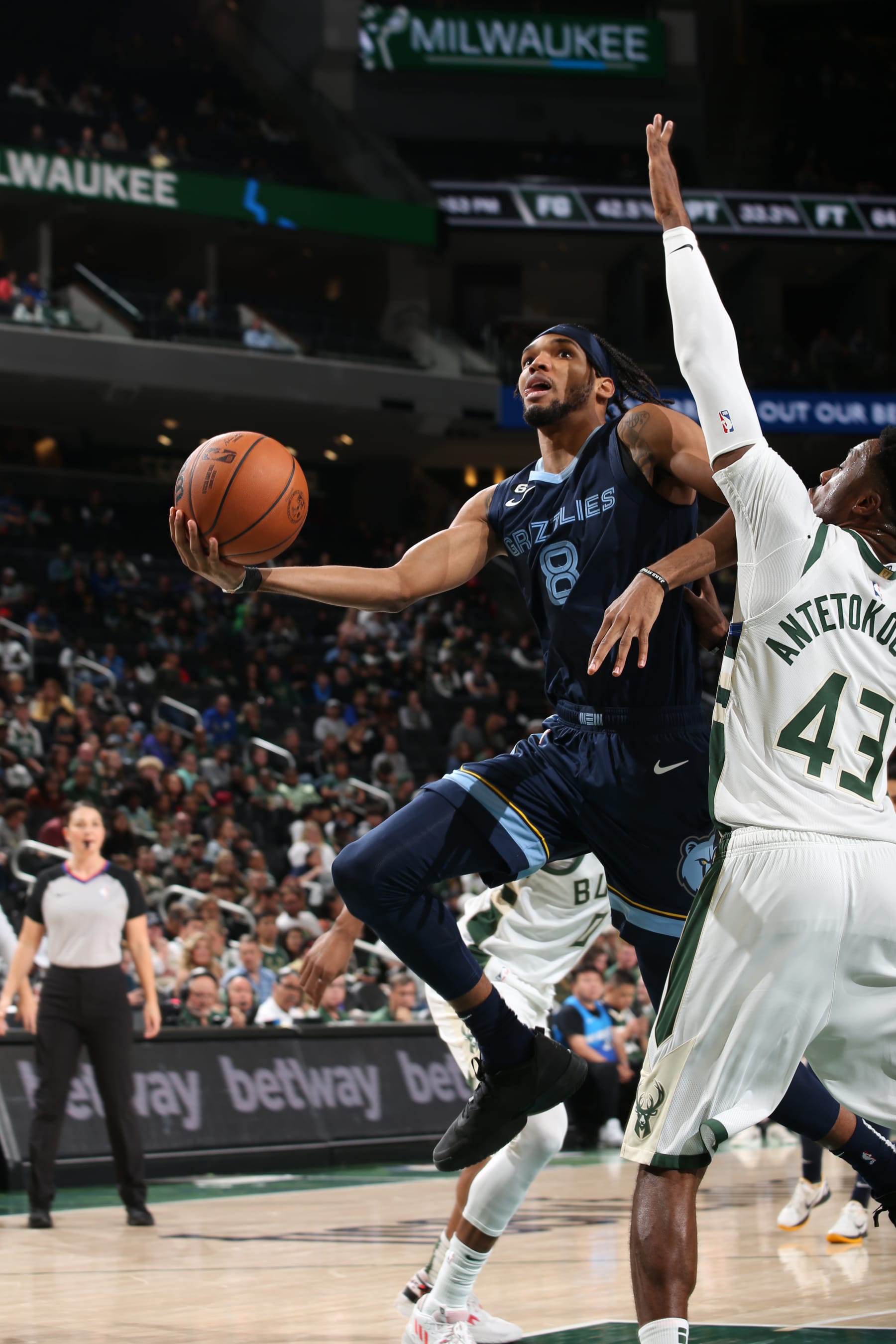 MILWAUKEE, WI - OCTOBER 1: Ziaire Williams #8 of the Memphis Grizzlies drives to the basket against the Milwaukee Bucks during a preseason game on October 1, 2022 at the Fiserv Forum Center in Milwaukee, Wisconsin. NOTE TO USER: User expressly acknowledges and agrees that, by downloading and or using this Photograph, user is consenting to the terms and conditions of the Getty Images License Agreement. Mandatory Copyright Notice: Copyright 2022 NBAE (Photo by Gary Dineen/NBAE via Getty Images).