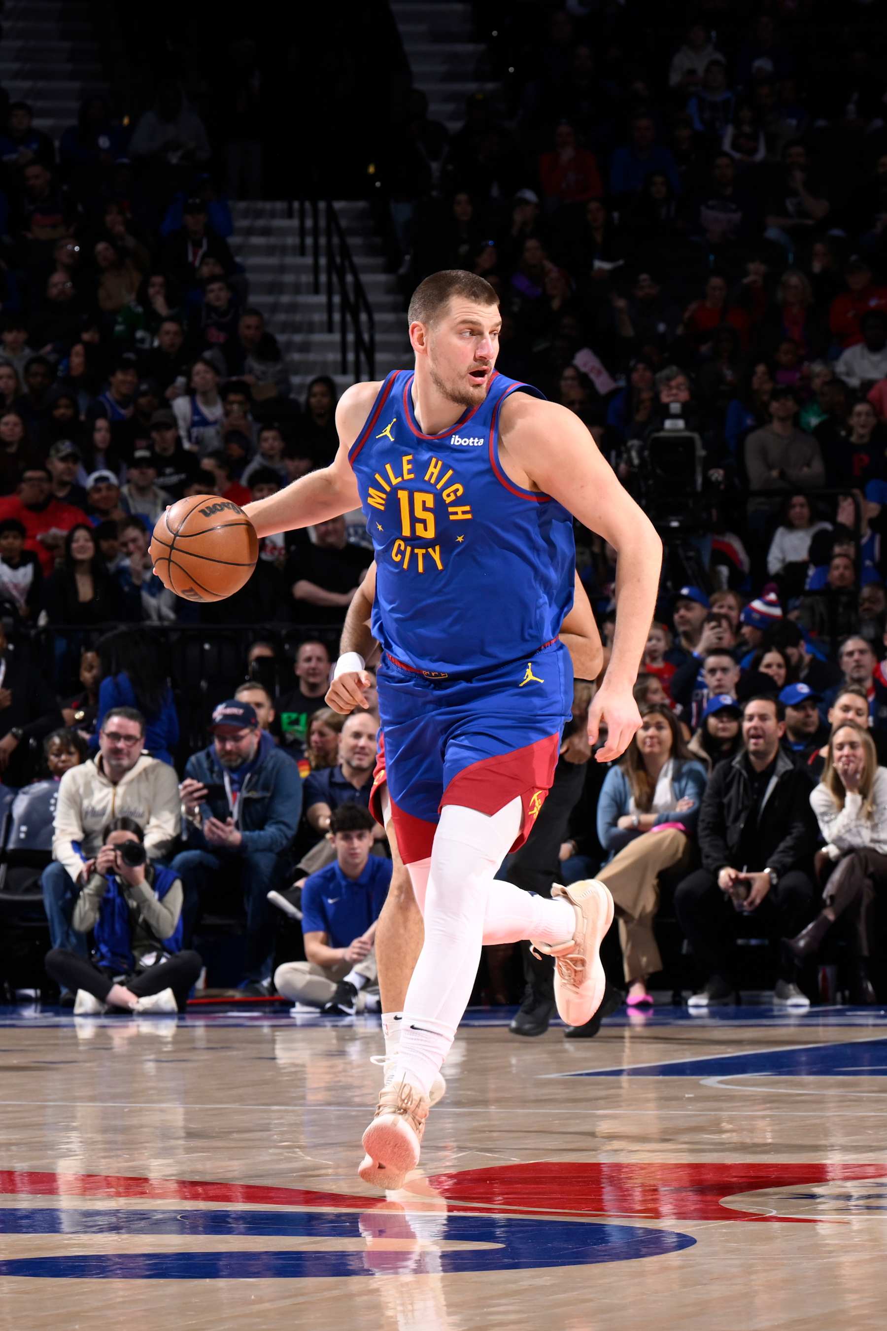 PHILADELPHIA, PA - JANUARY 31: Nikola Jokic #15 of the Denver Nuggets dribbles the ball during the game against the Philadelphia 76ers on January 31, 2025 at the Wells Fargo Center in Philadelphia, Pennsylvania NOTE TO USER: User expressly acknowledges and agrees that, by downloading and/or using this Photograph, user is consenting to the terms and conditions of the Getty Images License Agreement. Mandatory Copyright Notice: Copyright 2025 NBAE (Photo by David Dow/NBAE via Getty Images)