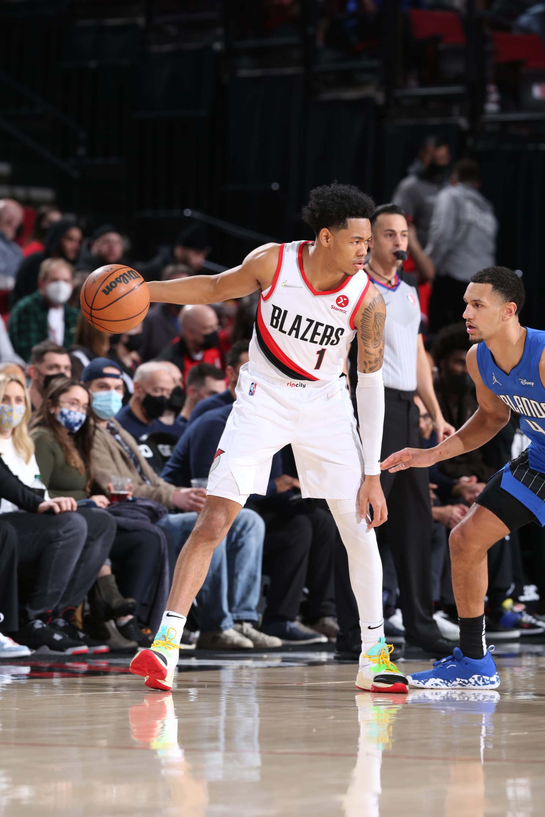 PORTLAND, OR - FEBRUARY 8: Anfernee Simons #1 of the Portland Trail Blazers handles the ball during the game against the Orlando Magic on February 8, 2022 at the Moda Center Arena in Portland, Oregon. NOTE TO USER: User expressly acknowledges and agrees that, by downloading and or using this photograph, user is consenting to the terms and conditions of the Getty Images License Agreement. Mandatory Copyright Notice: Copyright 2022 NBAE (Photo by Sam Forencich/NBAE via Getty Images)