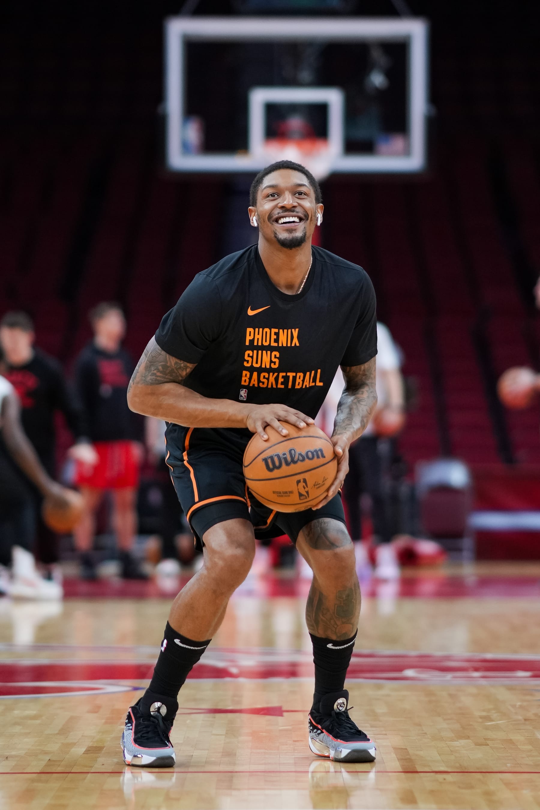 HOUSTON, TEXAS - DECEMBER 27: Bradley Beal #3 of the Phoenix Suns lines up to shoot the ball during warmups prior to the game against the Houston Rockets at Toyota Center on December 27, 2023 in Houston, Texas. User expressly acknowledges and agrees that, by downloading and or using this photograph, User is consenting to the terms and conditions of the Getty Images License Agreement. (Photo by Alex Bierens de Haan/Getty Images)