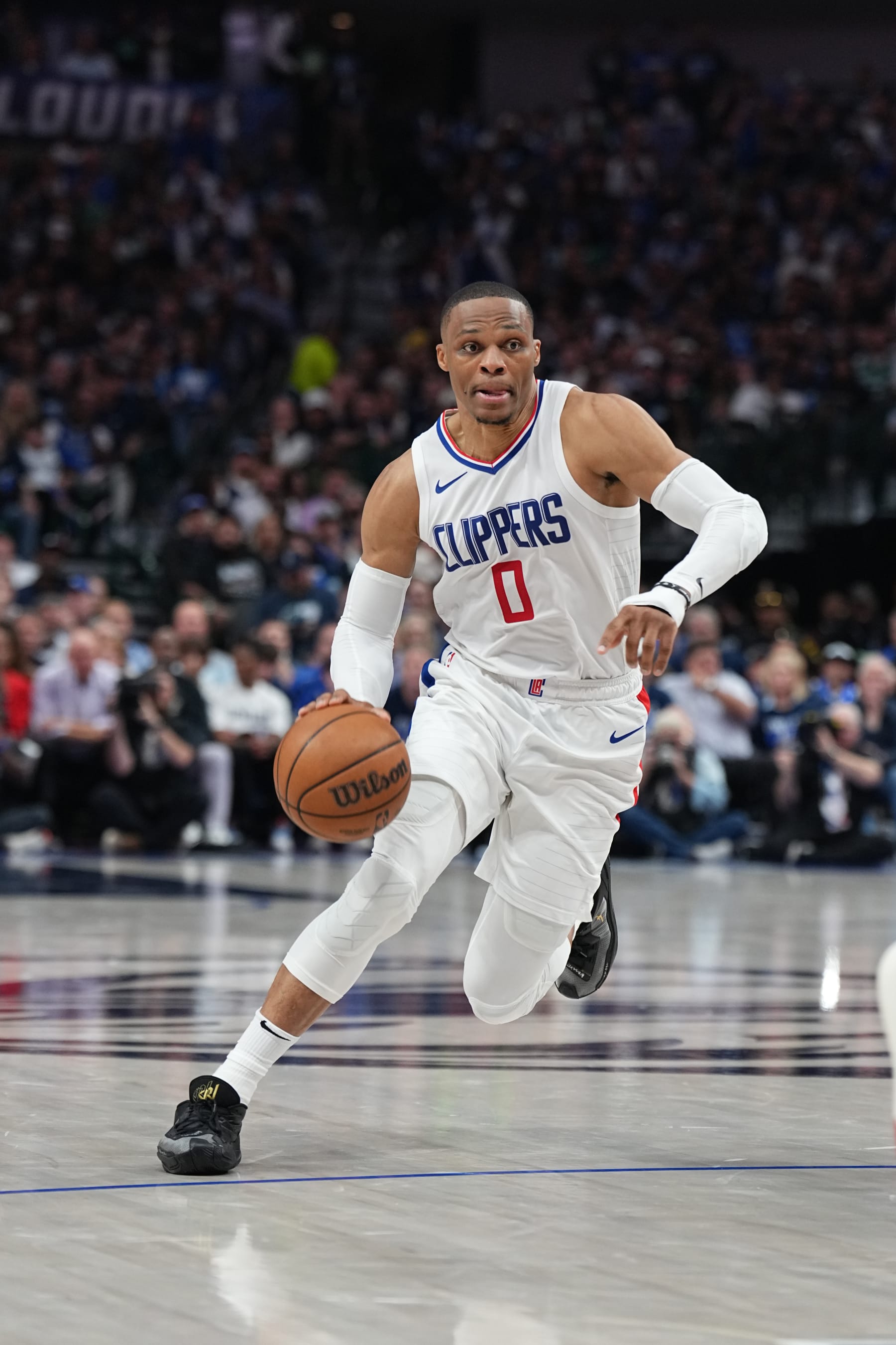 DALLAS, TX - APRIL 26: Russell Westbrook #0 of the LA Clippers dribbles the ball during the game against the Dallas Mavericks during Round 1 Game 3 of the 2024 NBA Playoffs on April 26, 2024 at the American Airlines Center in Dallas, Texas. NOTE TO USER: User expressly acknowledges and agrees that, by downloading and or using this photograph, User is consenting to the terms and conditions of the Getty Images License Agreement. Mandatory Copyright Notice: Copyright 2023 NBAE (Photo by Glenn James/NBAE via Getty Images)